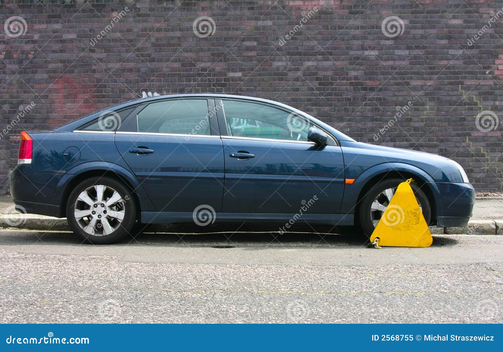 Clamped vehicle stock image. Image of yellow, clamp, warning 2568755