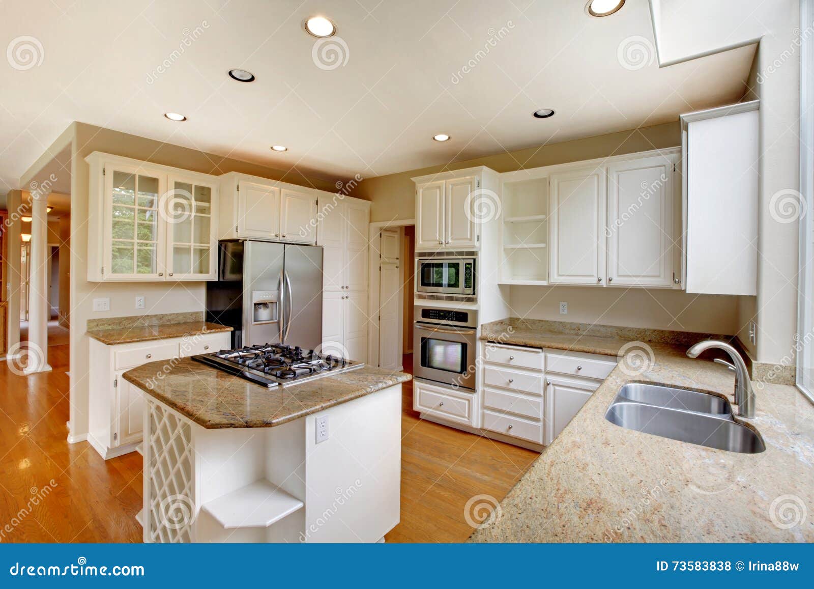 classic american kitchen interior with white cabinets and built-in classic american kitchen interior with white cabinets and built-in