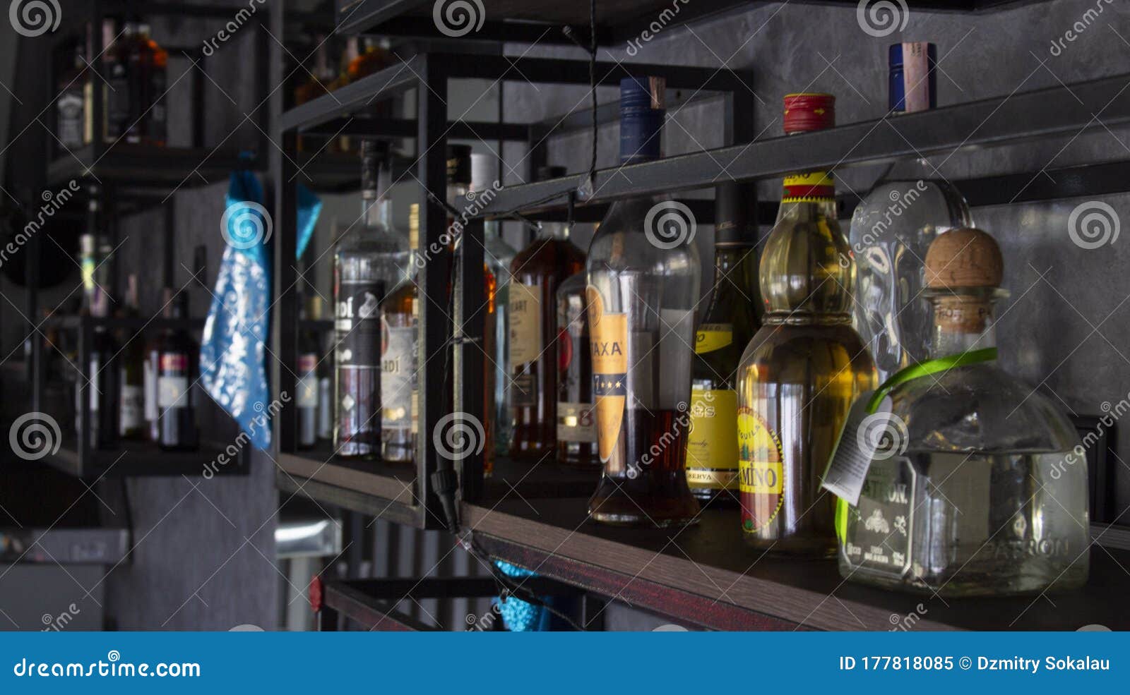 Classic Bar Counter with Bottles of Different Alcohol Editorial Image
