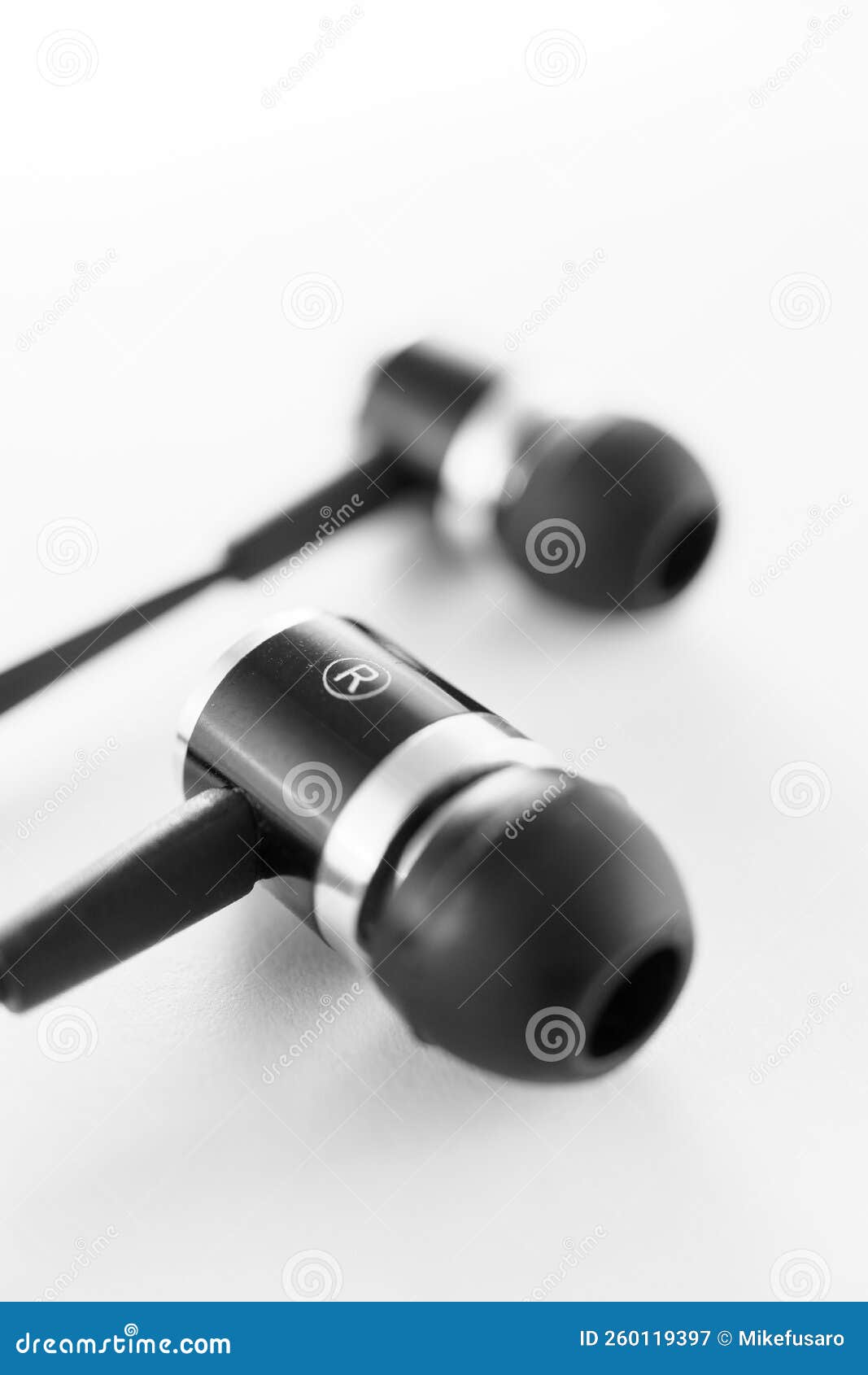 Classic black earbuds stock image. Image of earphones 260119397