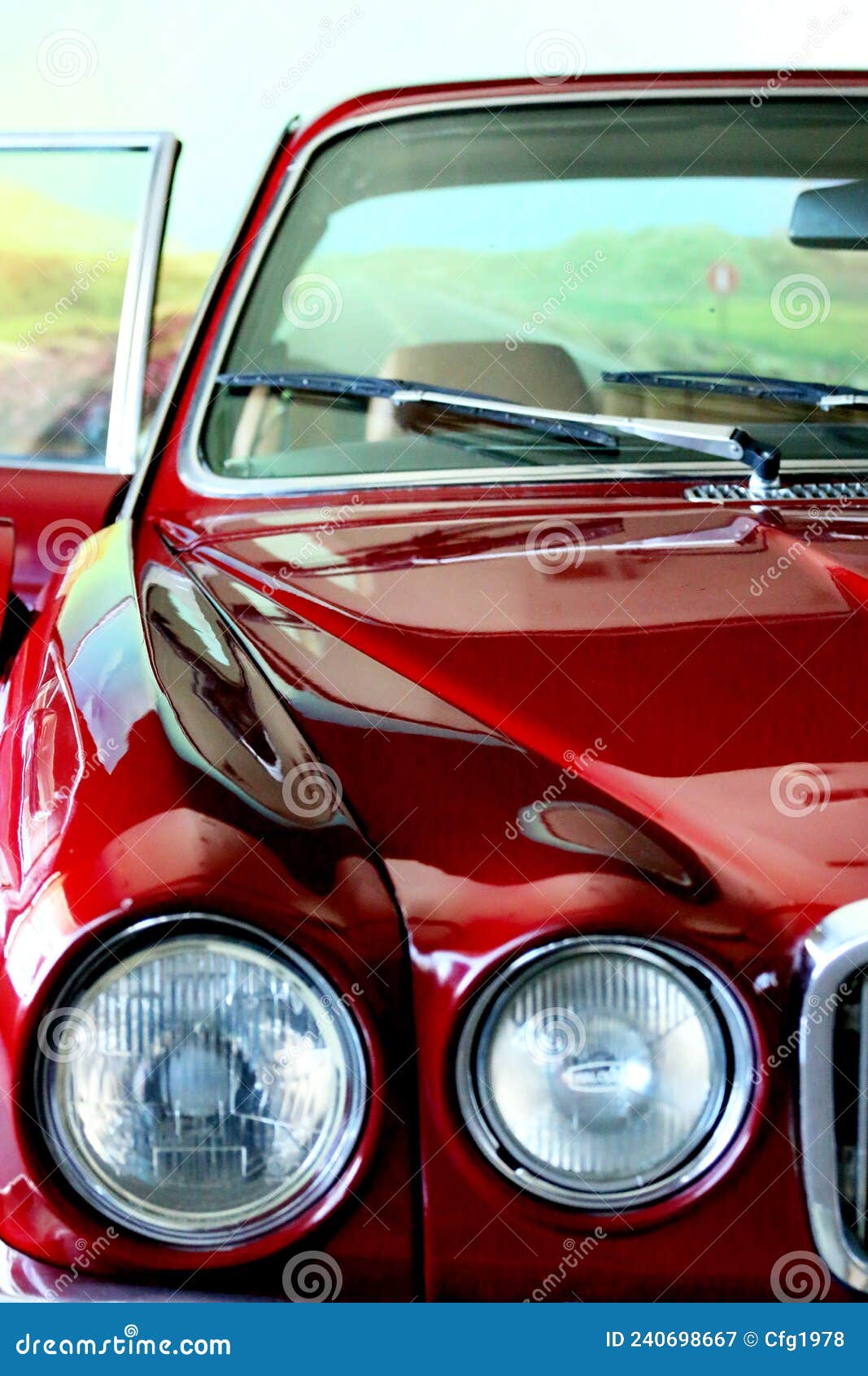 classic  car. red car. view of the rear seat in brown leather. close up. high-end car. collectable. vehicle. conveyance. rea