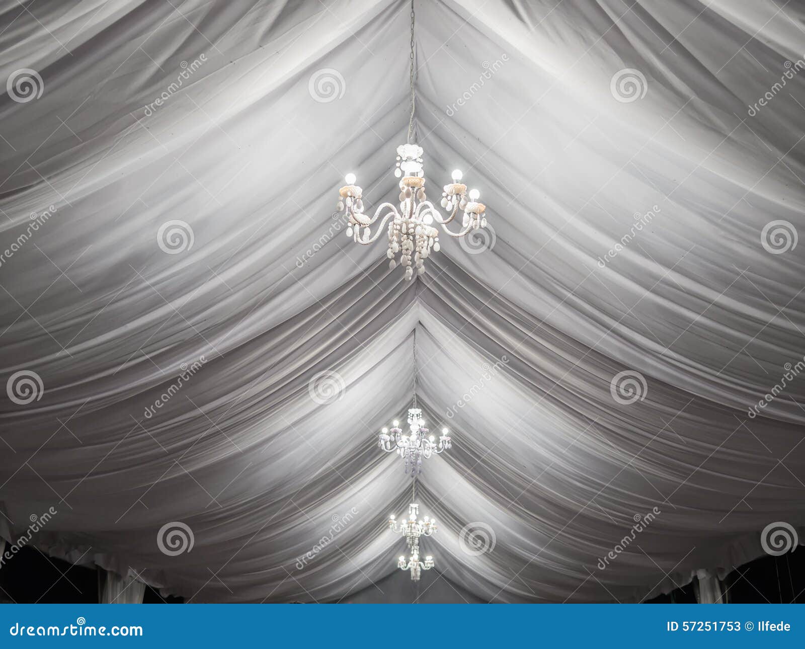 classic chandeliers on party tent