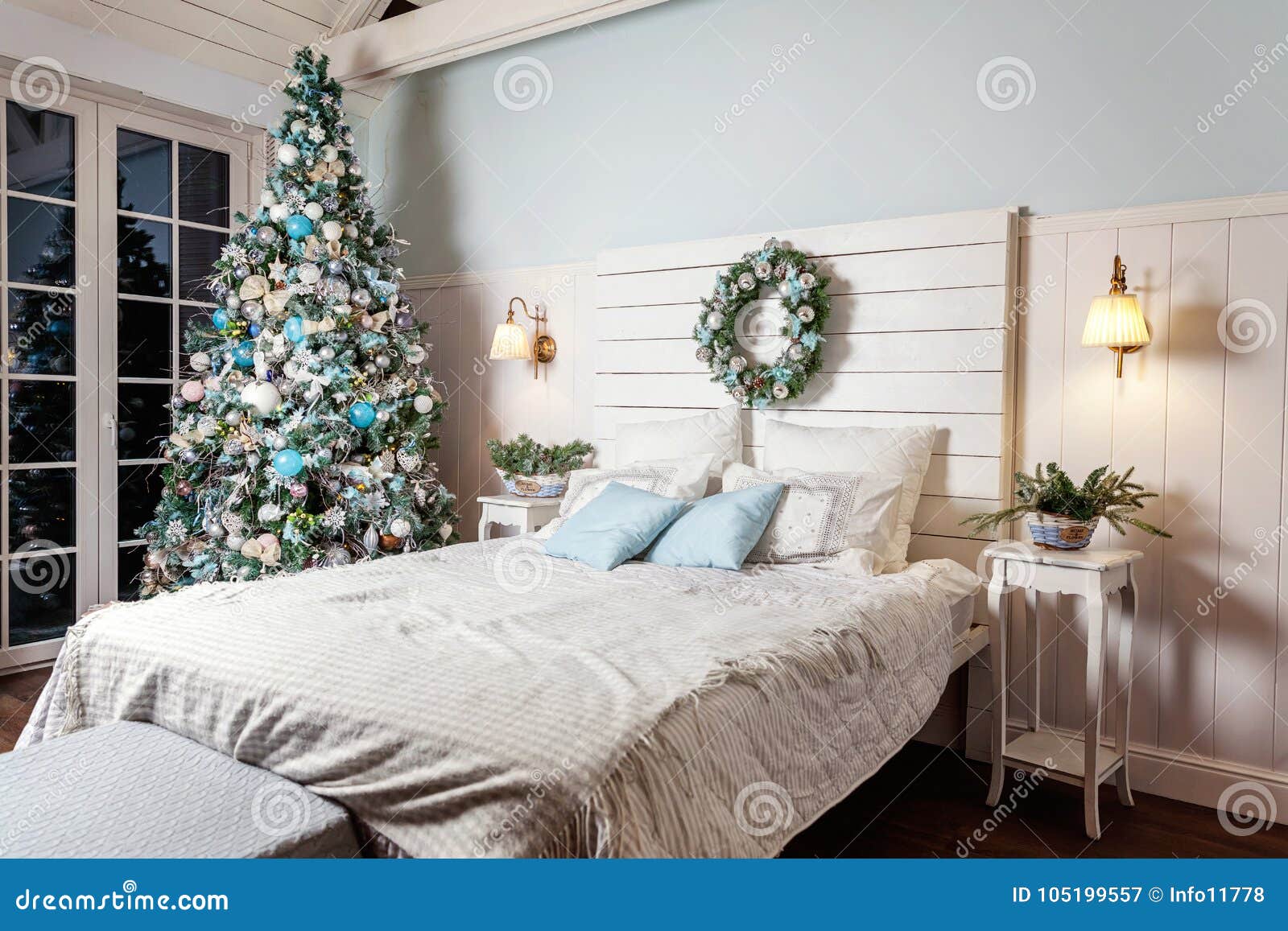 Christmas Tree With White Blue And Silver Decorations Stock
