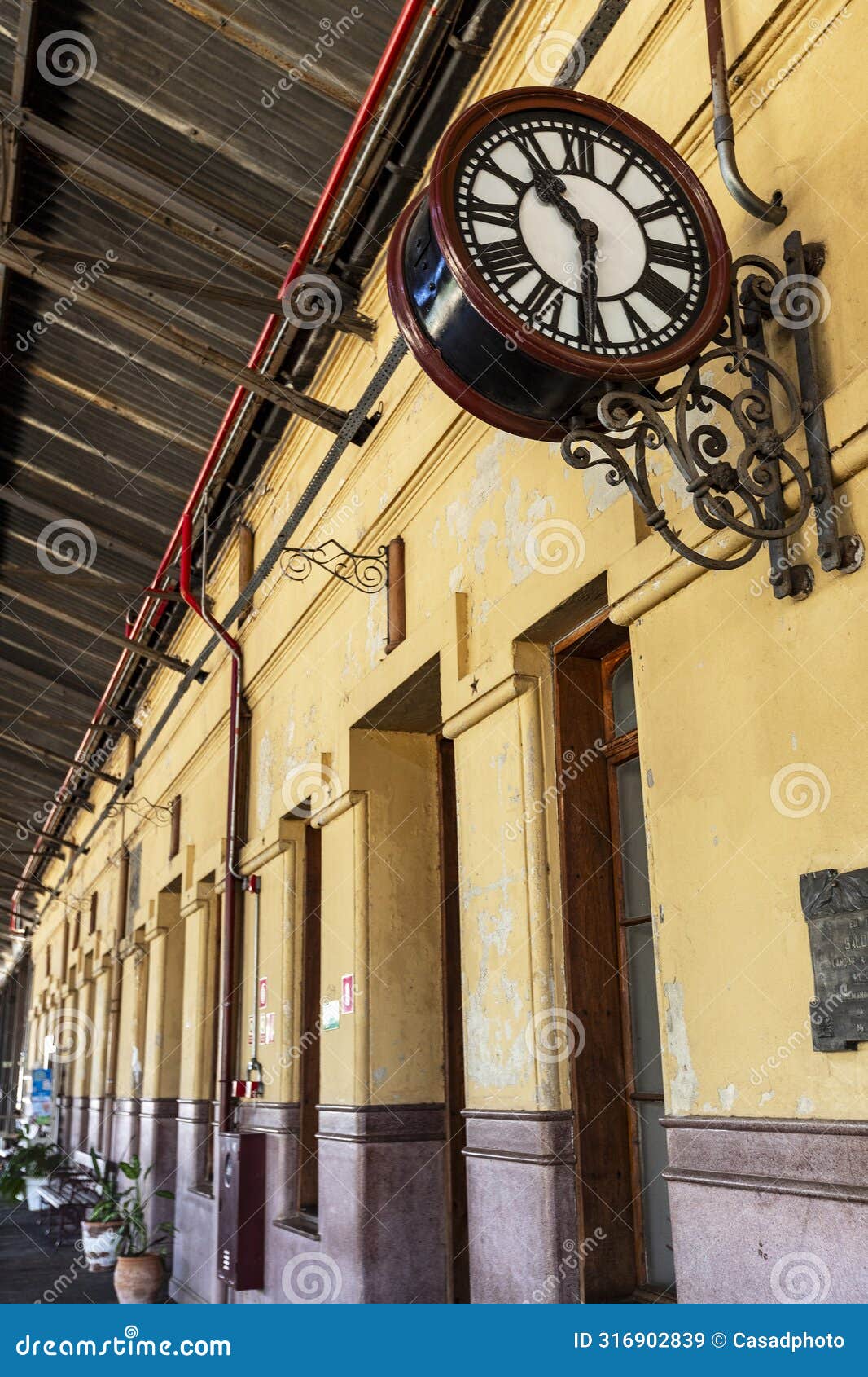 antique clock with roman numerals at the deactivated train station, today estacao cultura in campinas, state of sao paulo, brazil