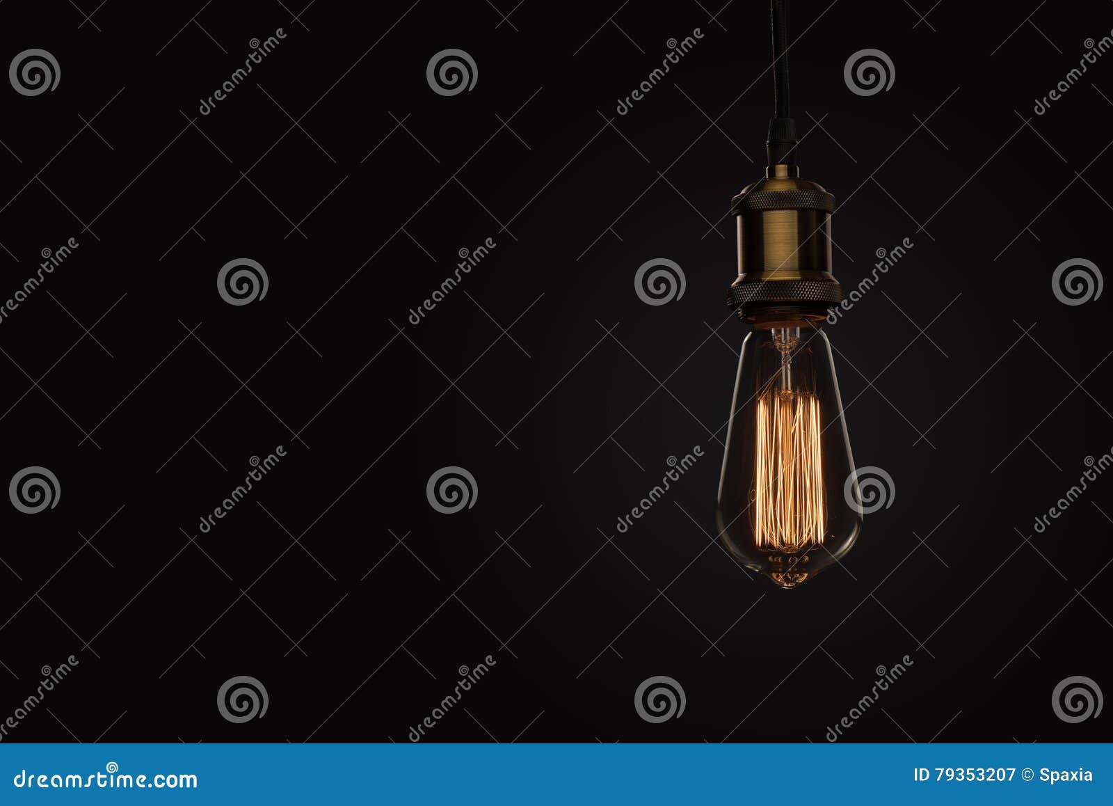 Classic Edison Light Bulb on Black Background Stock Image Image of