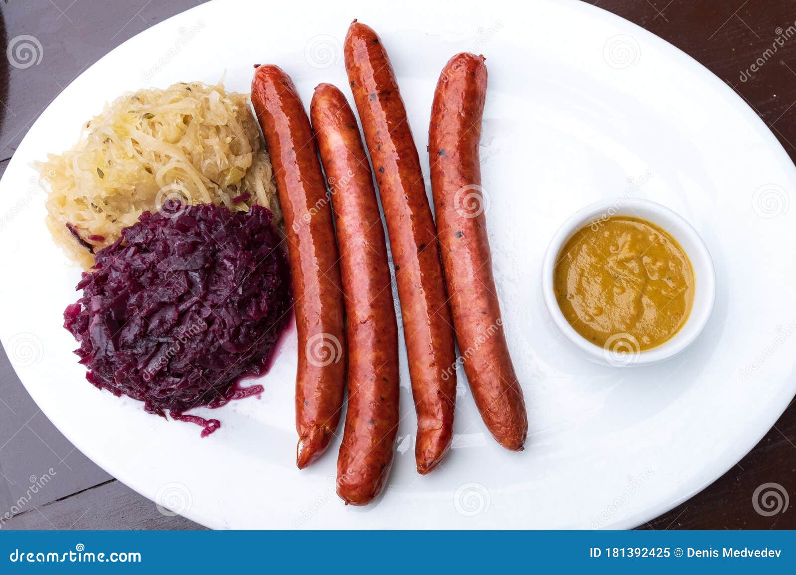 Classic German Snacks, Sausages with Mustard Cabbage and Bagel on a