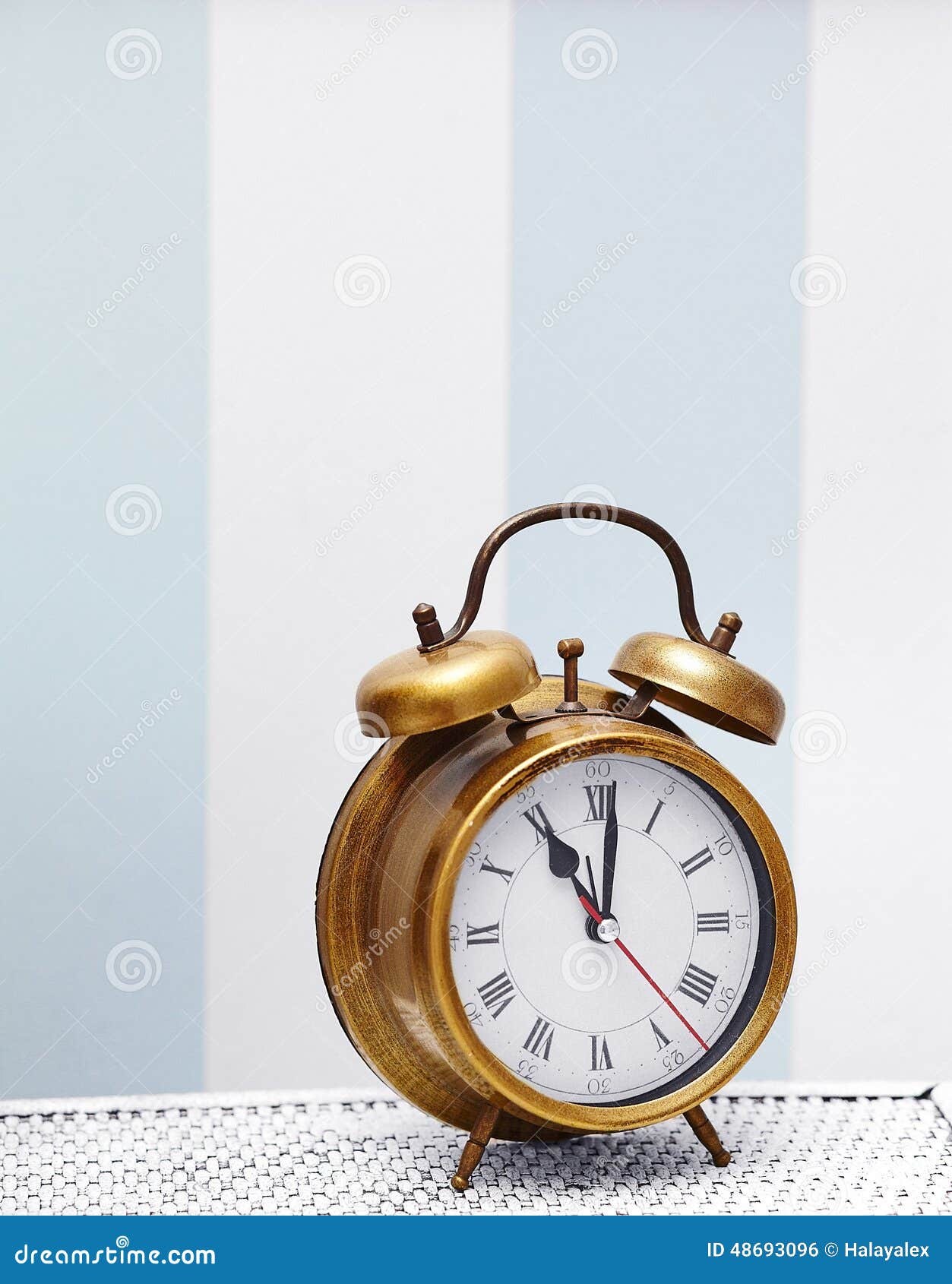 Classic Gold Clock Watch in Bright Colorful Interior Stock Photo