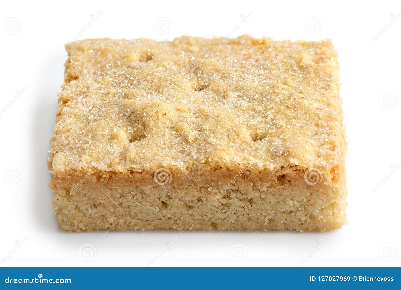 Classic homemade square shortbread biscuit isolated on white. Sugar on top.