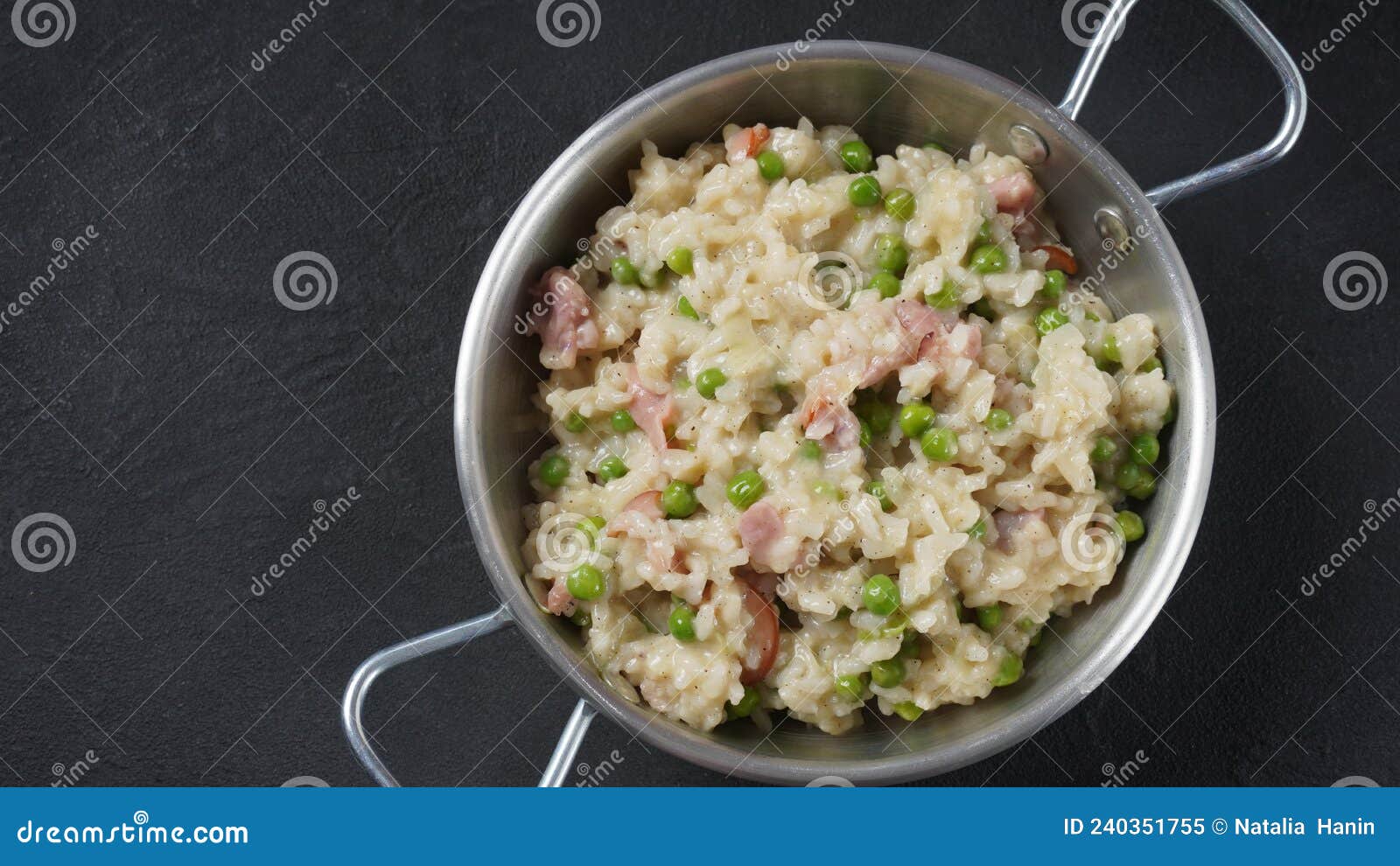 classic italian risotto with peas, cheese parmesan, prosciutto.