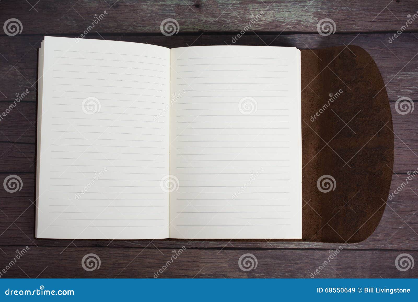 Classic Leather Bound Journal Book Fully Open on a Old Barn Board Floor