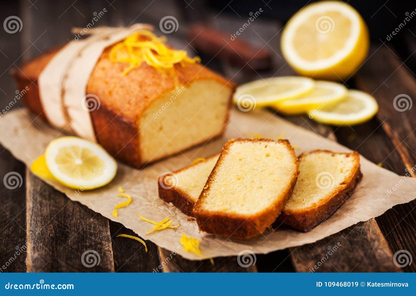 classic lemon pound cake on rustic wooden background