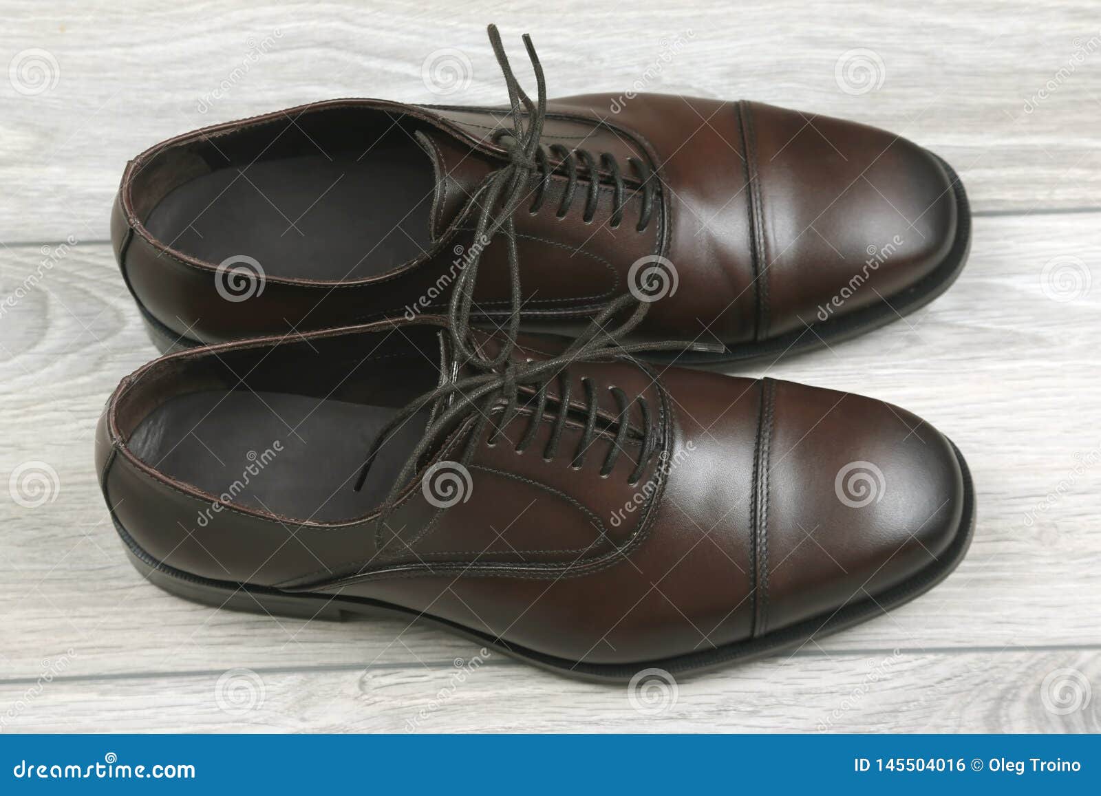 Classic men`s brown shoes stock photo. Image of brown 145504016