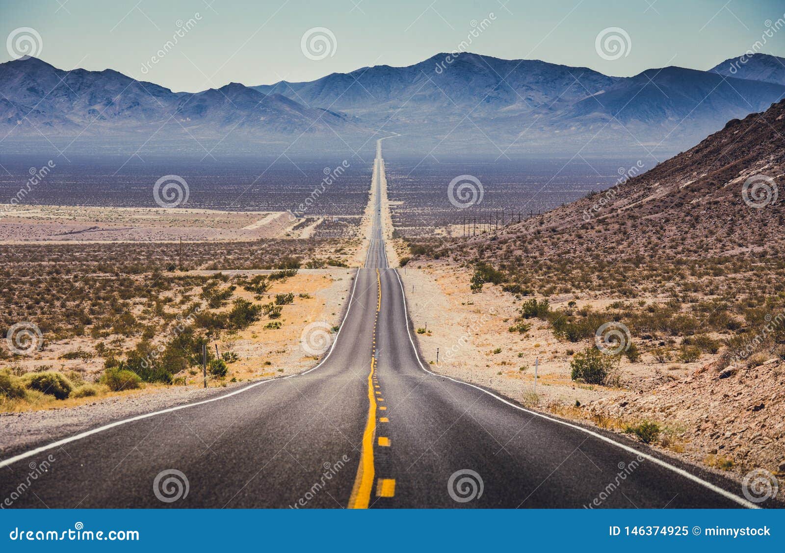 endless straight road in the american southwest, usa