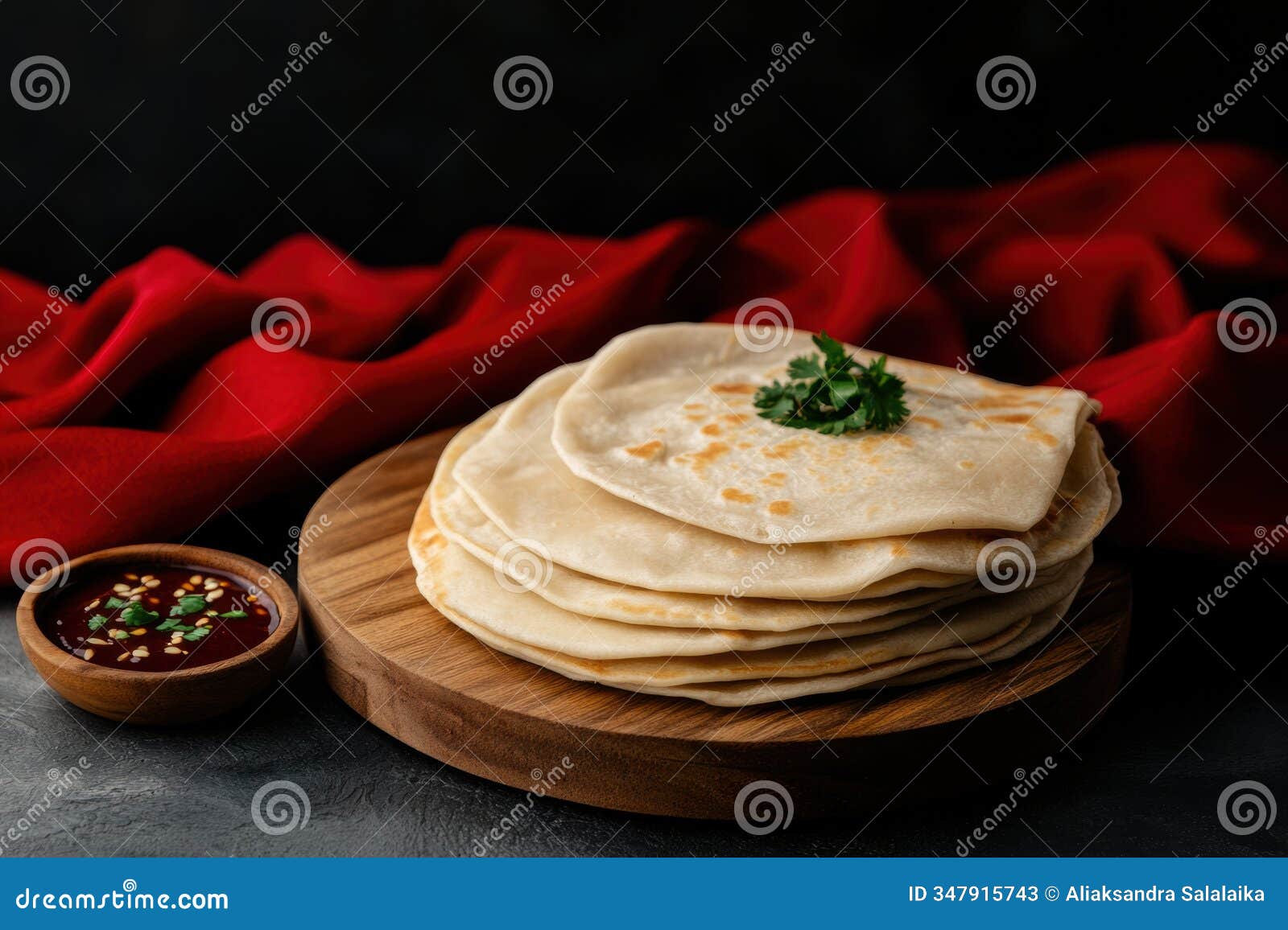 culinary presentation, classic peking duck displayed on a wooden board with pancakes and hoisin sauce, set against a