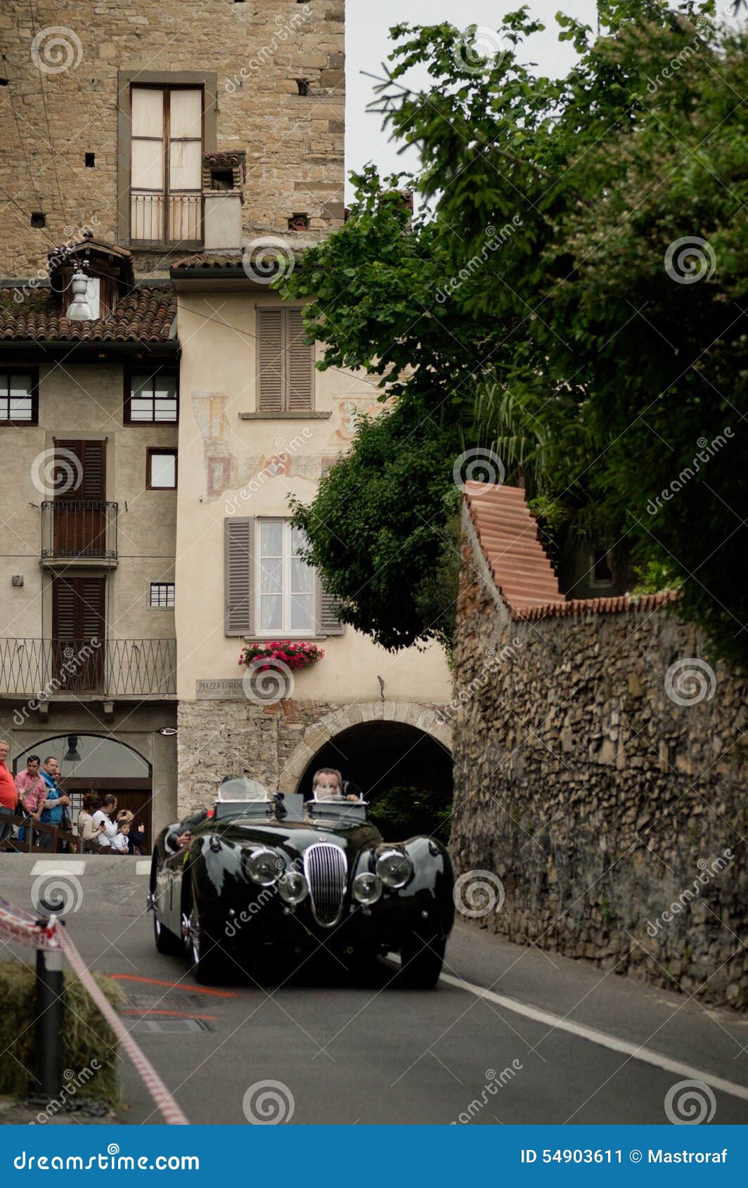 Classic race car at Bergamo Historic Grand Prix 2015. A pre was race car driving down Boccola street in Citta Alta (the medieval part of Bergamo) during the 2015 Bergamo Historic Grand Prix