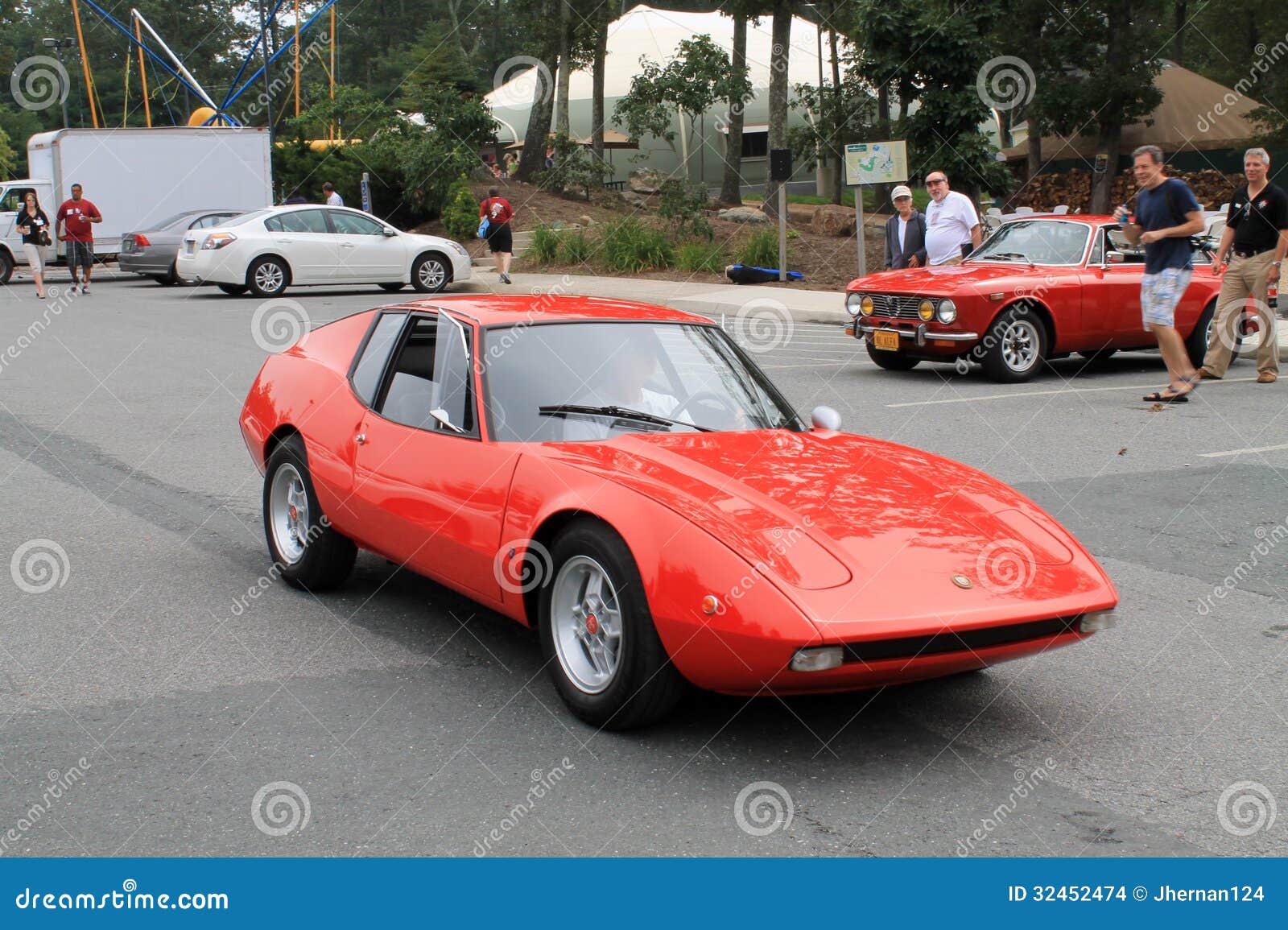 Classic rare 1970 fiat Lombardi grand prix sports car on downhill road 