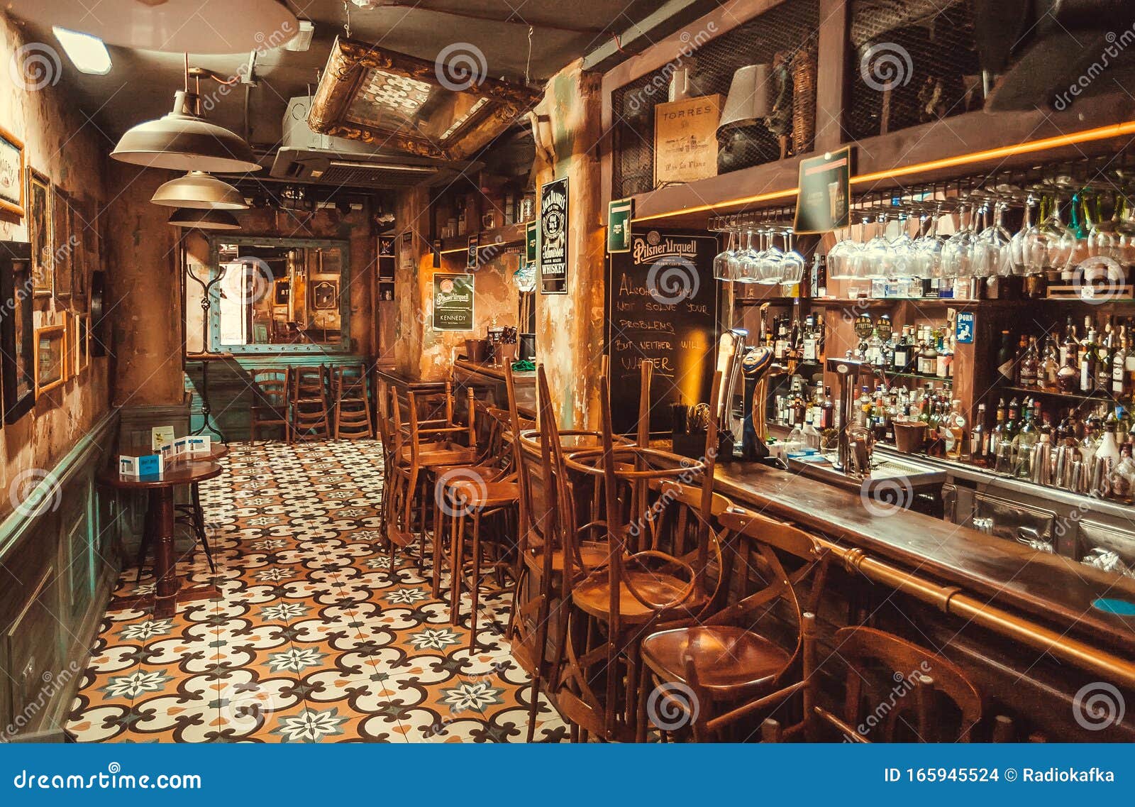 Classic Style Pub with Retro Decoration, Wooden Bar Counter and Bottles  Drinkers at Evening Editorial Stock Image - Image of atmosphere, clubbing:  165945524
