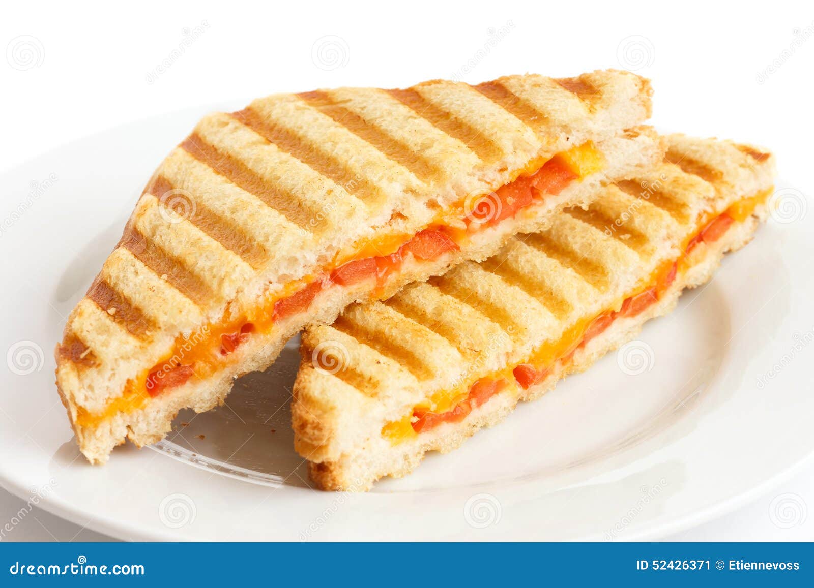Classic Tomato and Cheese Toasted Sandwich on White Plate Stock Image