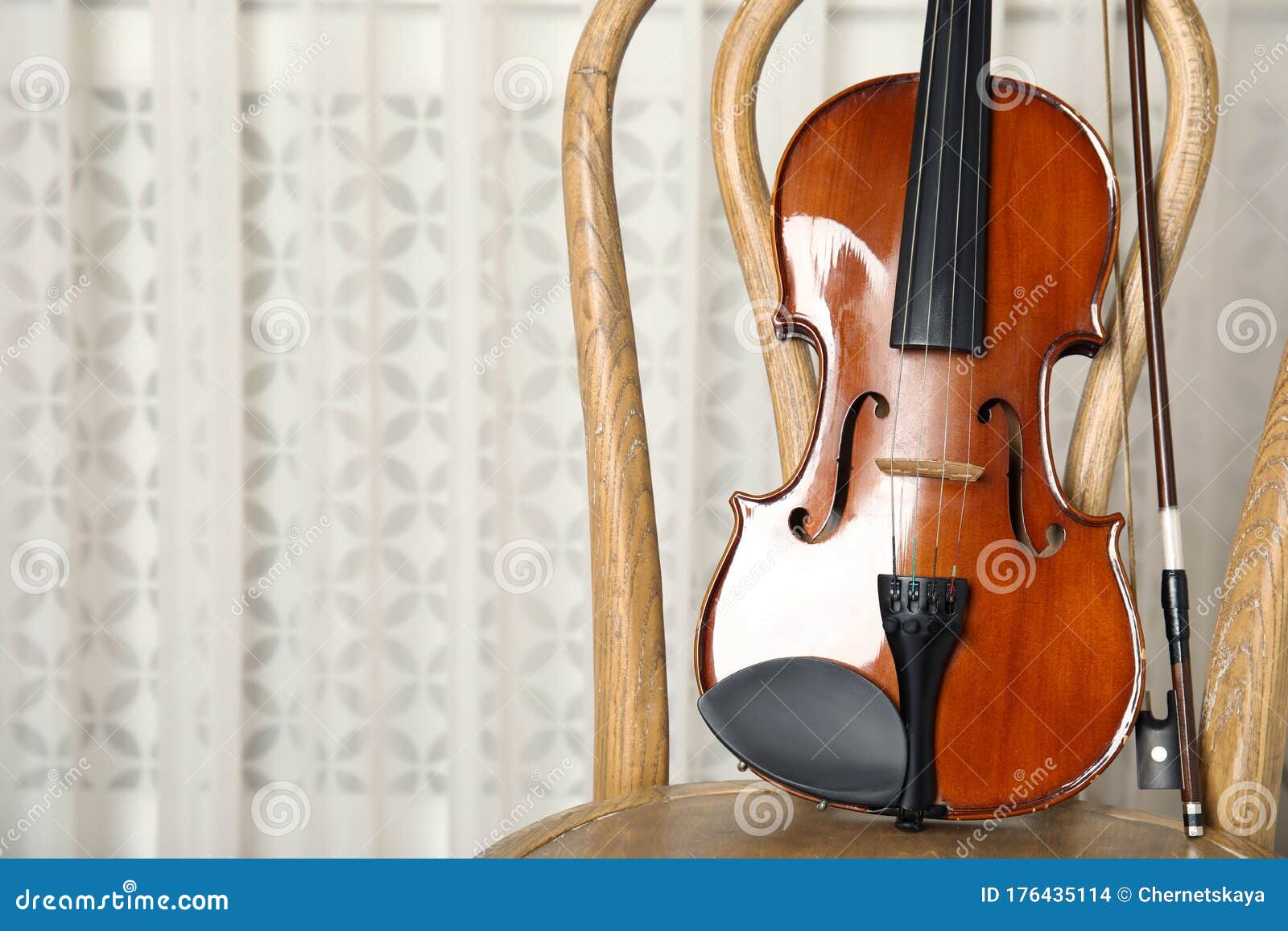 Classic Violin and Bow on Chair. Space for Text Stock Photo Image of