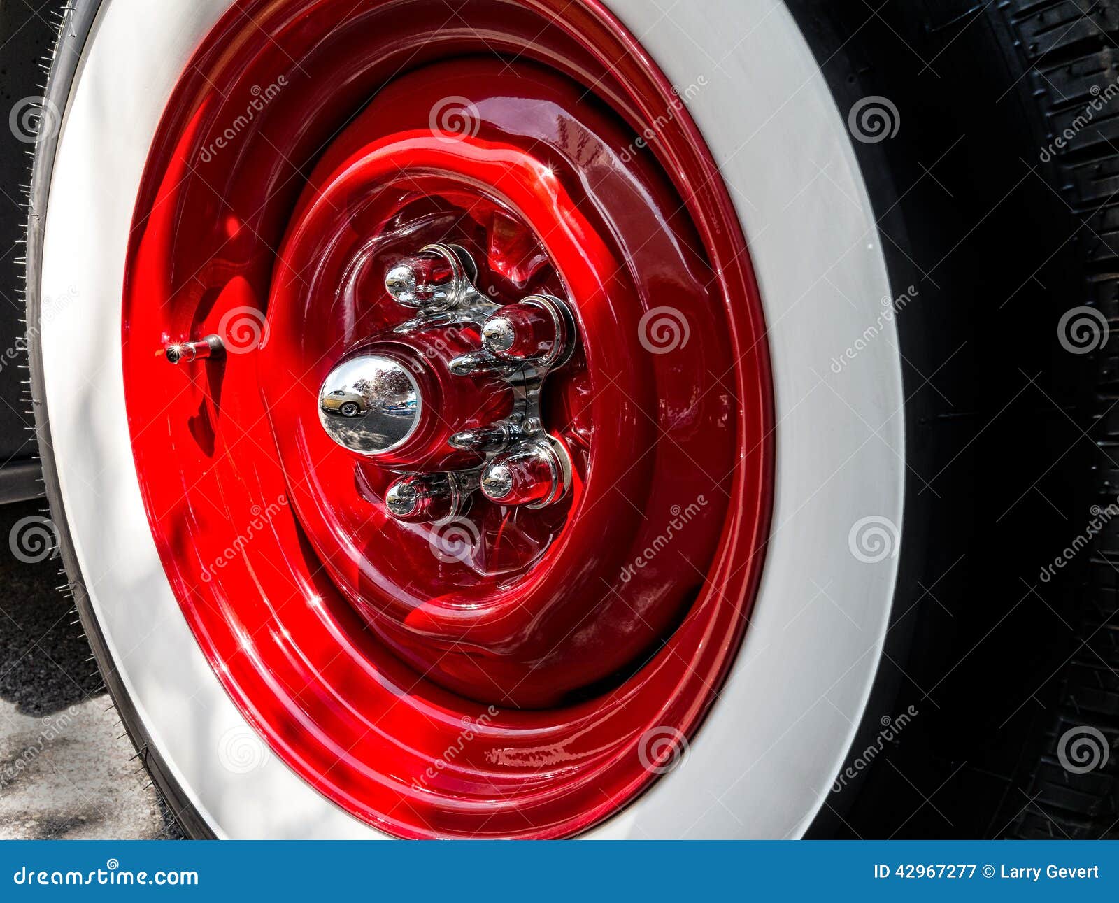 Closeup Of Whitewall Tires, Fender And Hubcap On Old Vintage Car With