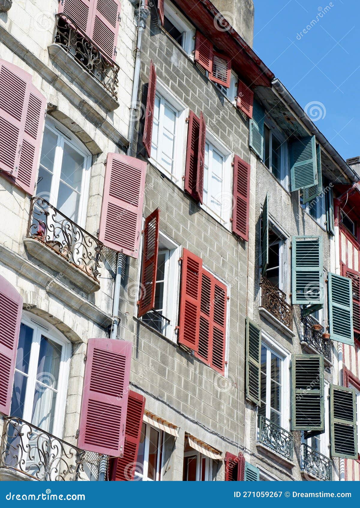 Premium Photo  Facade with doors and windows typical of the south of  france in the basque country bayonne