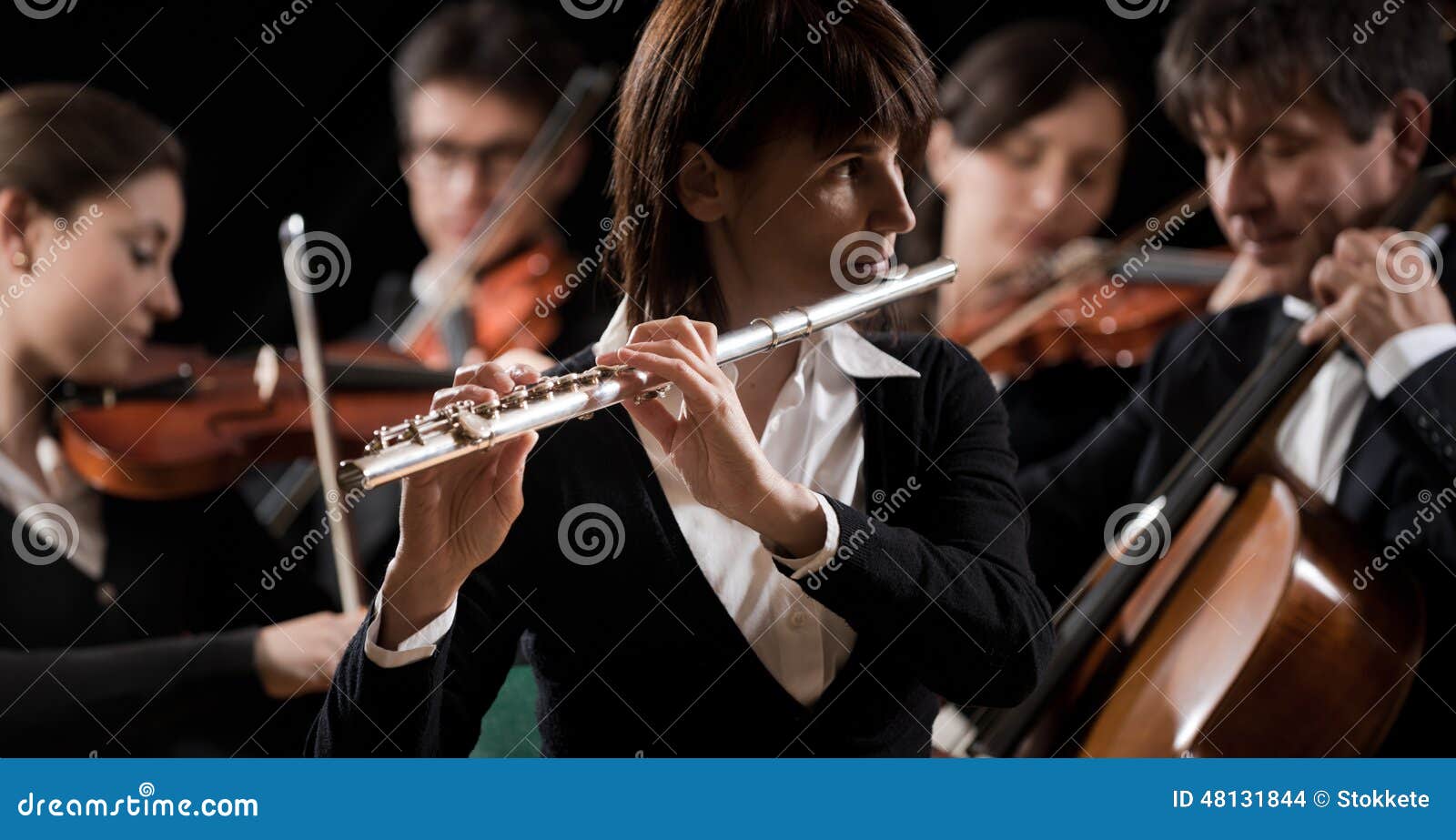 classical music concert: flutist close-up