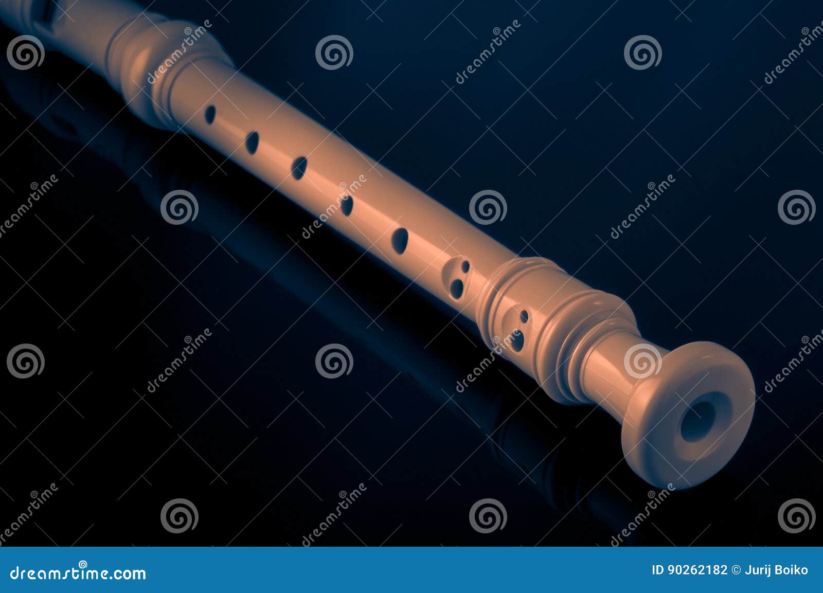 Classical Musical Instrument Is The Block Flute On Black Background
