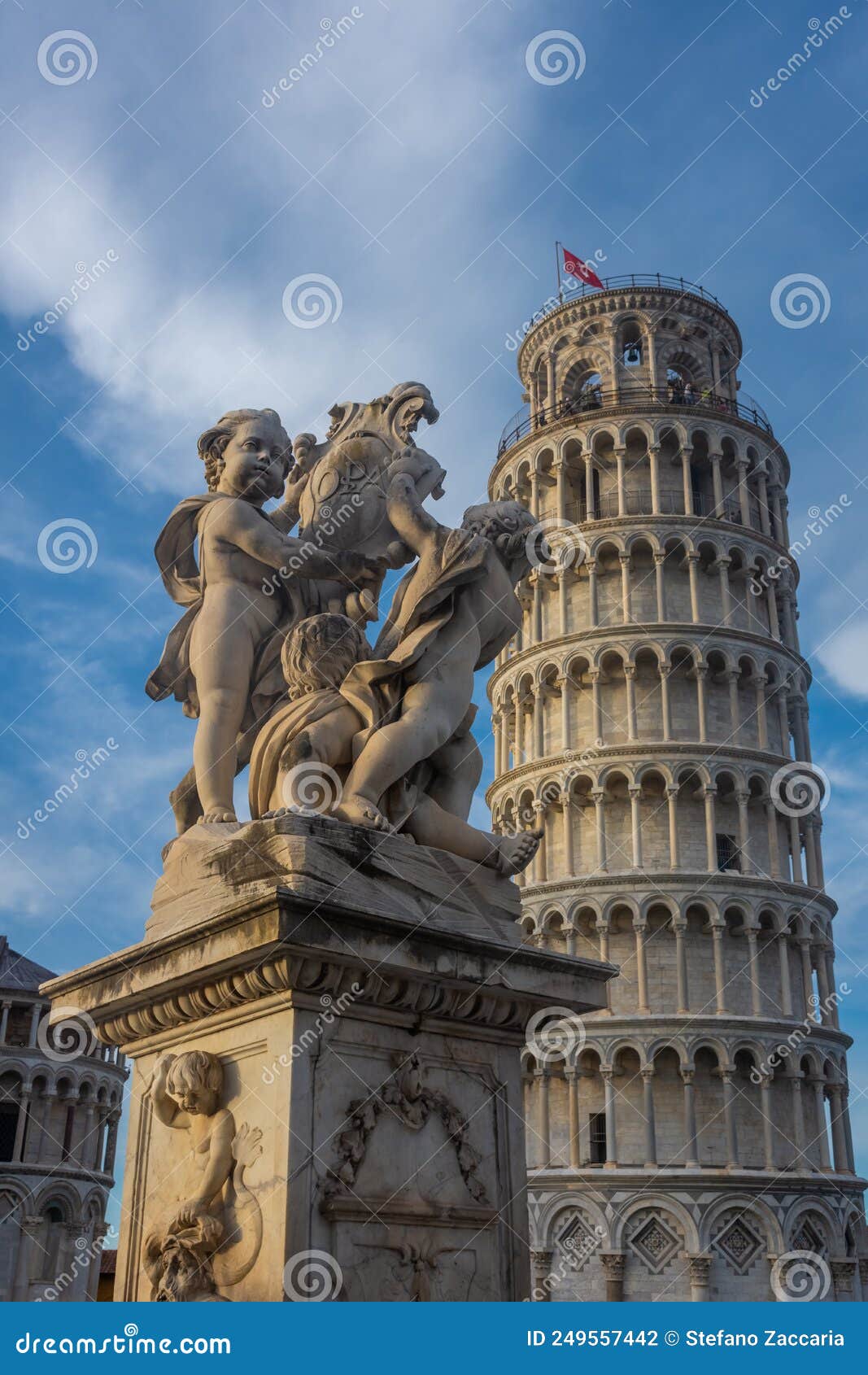 Classical Statue in Front of the Leaning Tower of Pisa, Italy Stock