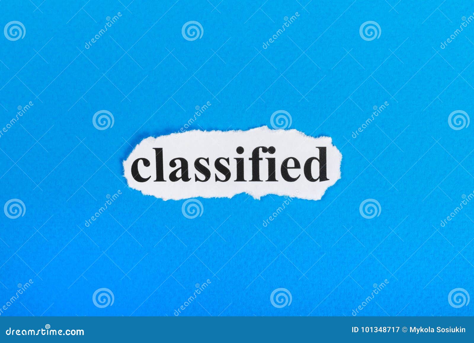 classified text on paper. word classified on torn paper. concept image