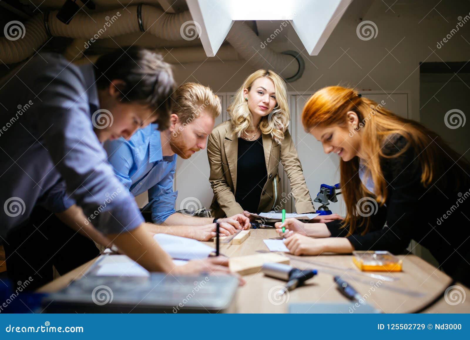 Classmates Working on a Project Together Stock Image - Image of ...