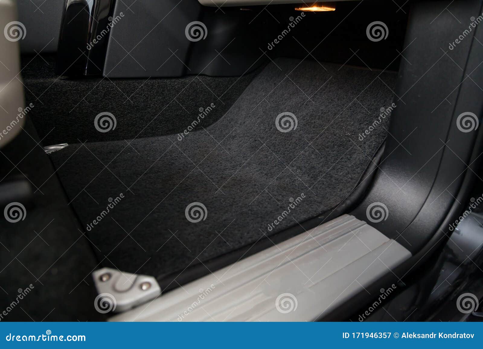 Clean Car Floor Mats Of Black Carpet Under Front Passenger Seat In