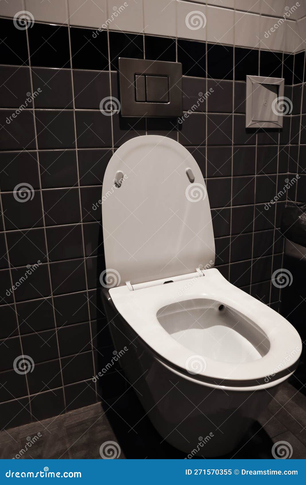 Clean Ceramic Toilet Bowl Near Tiled Wall Indoors Stock Image Image