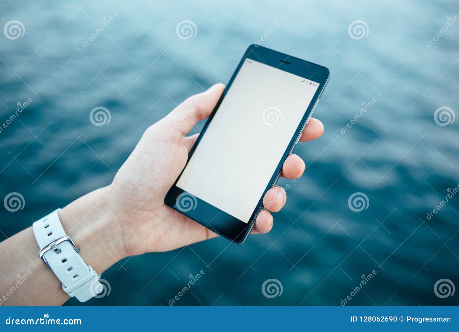 Clean Mobile Phone Screen Template in Female Hand Stock Photo