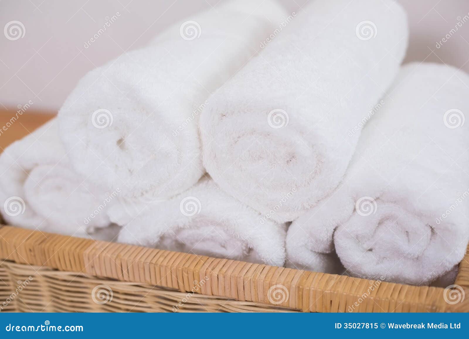 Clean rolled white towels stock image. Image of fold 35027815