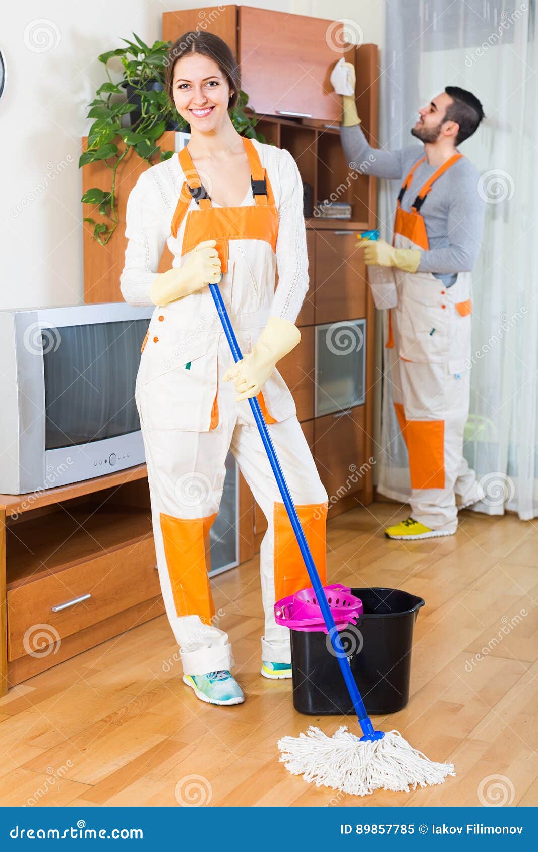 Cleaners cleaning in room stock image. Image of housework - 89857785