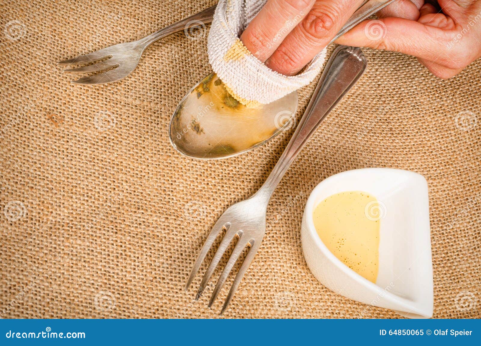 Woman Cleaning Silverware Stock Photo - Download Image Now