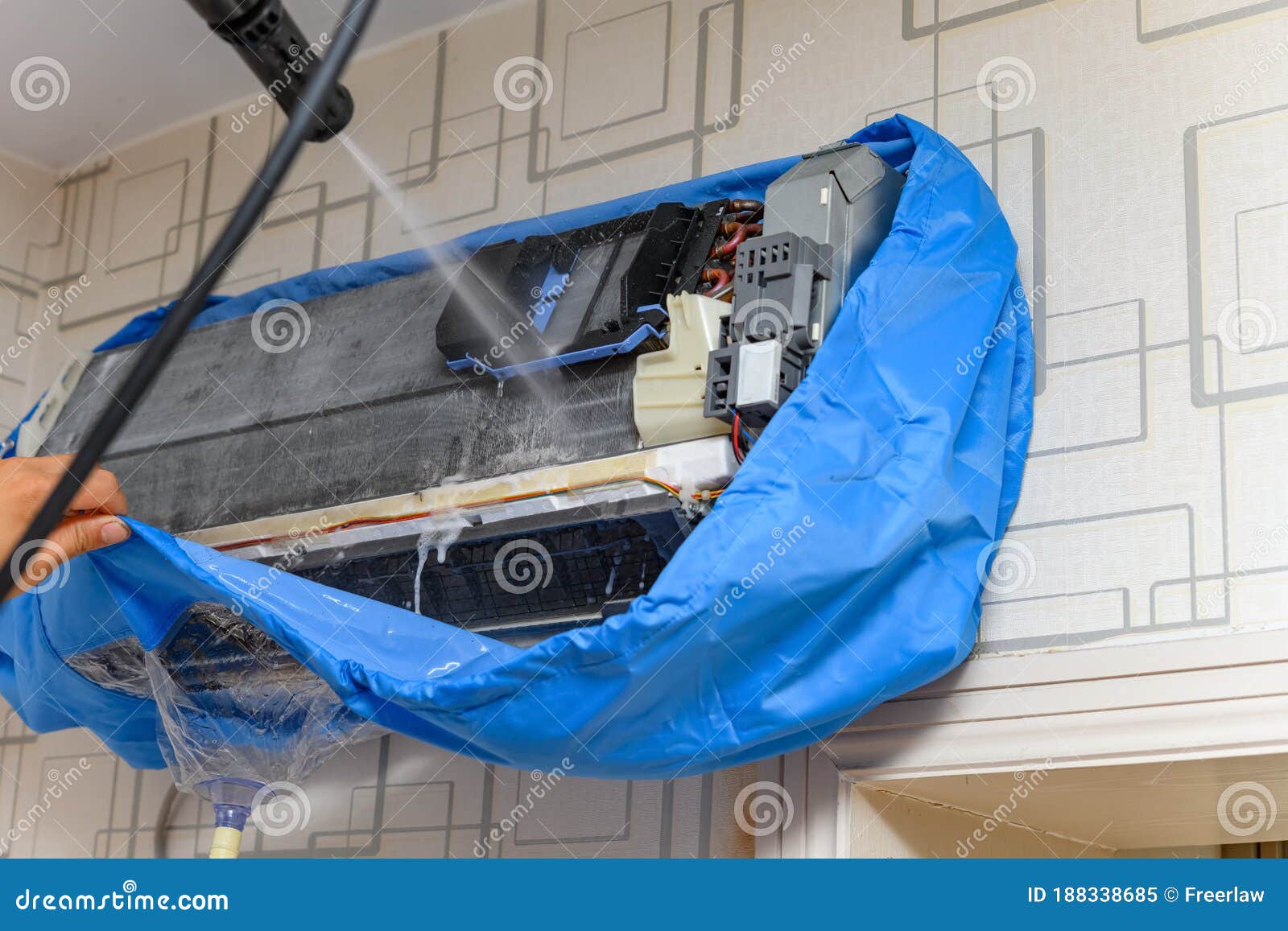 Cleaning the Air Conditioner with Some Chemical Liquid Stock Image