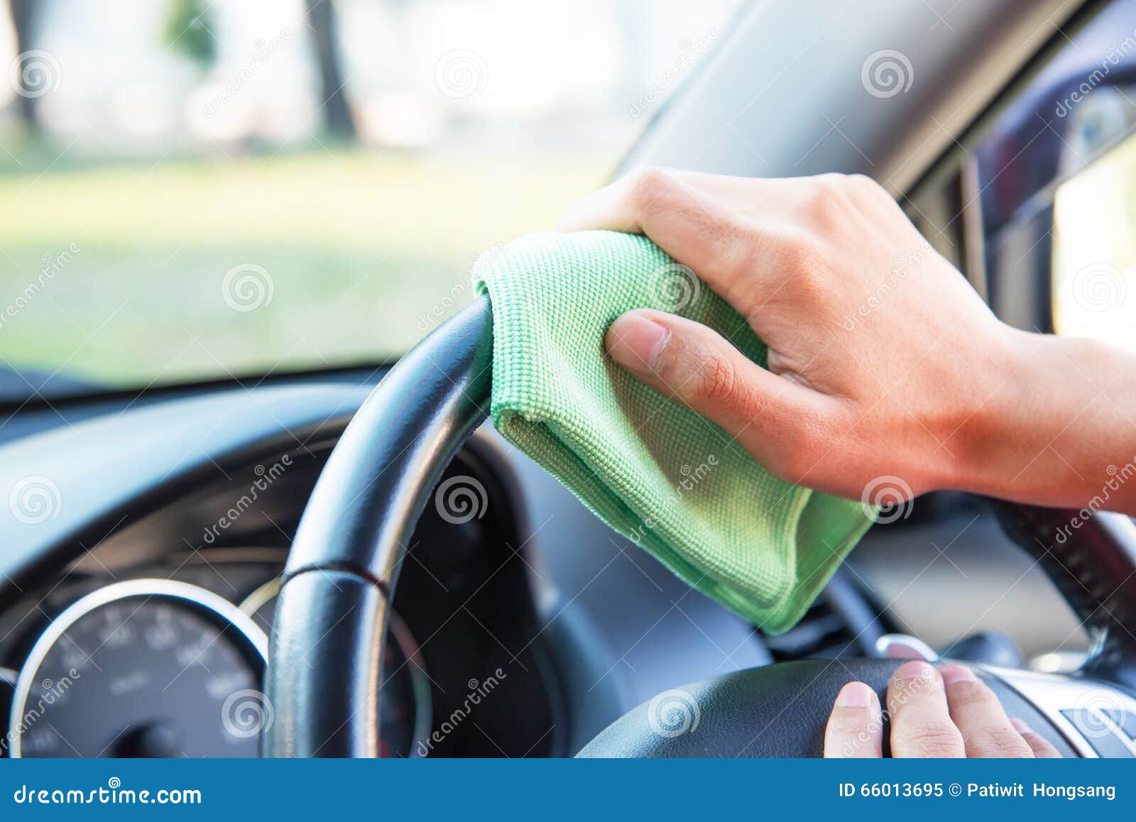 Cleaning the Car Interior with Green Microfiber Cloth Stock Image