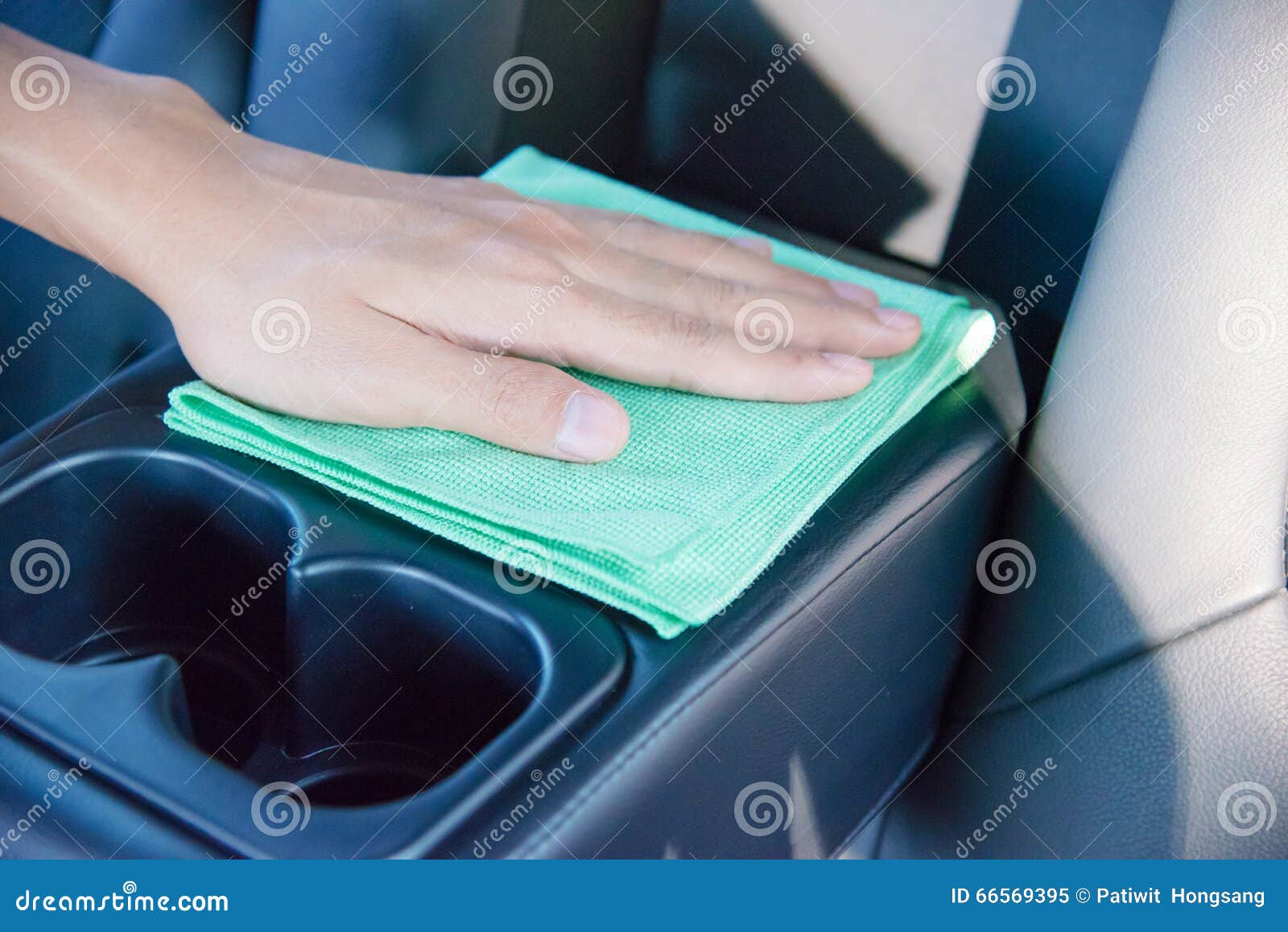 Cleaning the Car Interior with Green Microfiber Cloth Stock Image