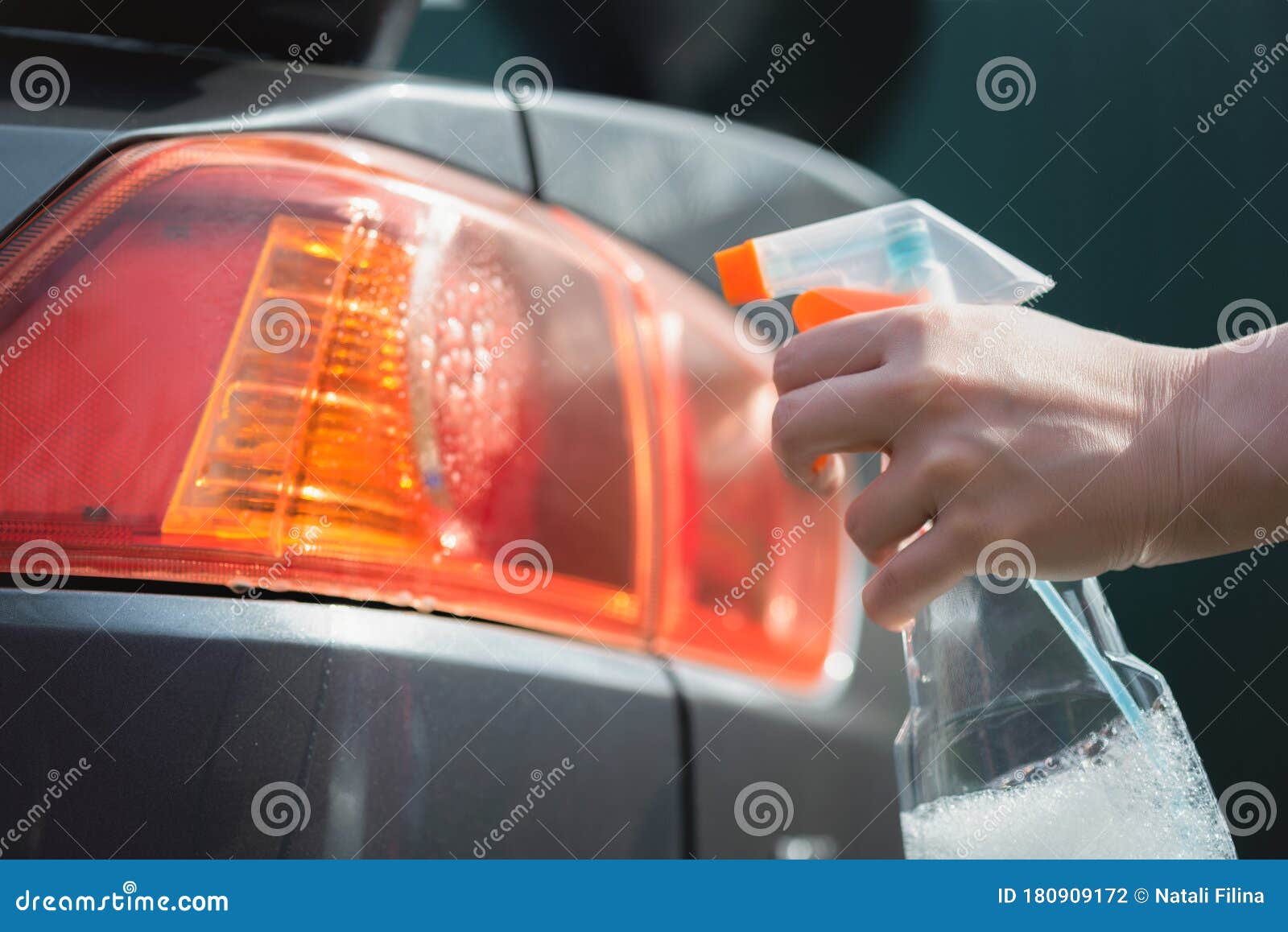 Cleaning a car rear lights stock photo. Image of automobile 180909172
