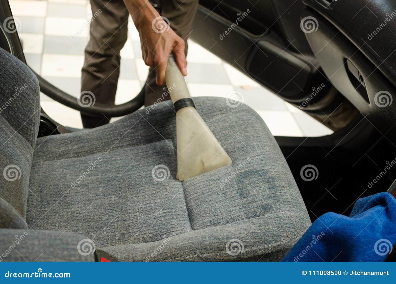Cleaning Of Car Seat With Wet Vacuum Cleaner Stock Photo