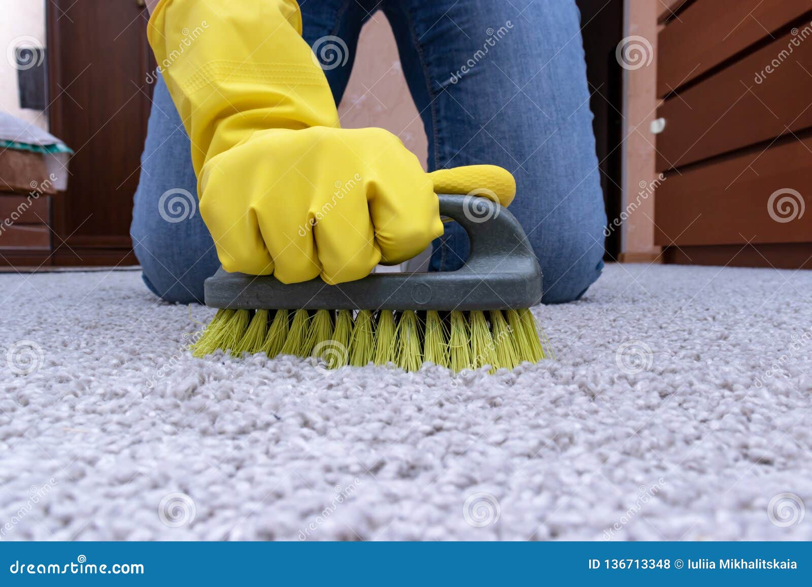 Cleaning Carpet with a Brush, Hands in Yellow Rubber Gloves Doing