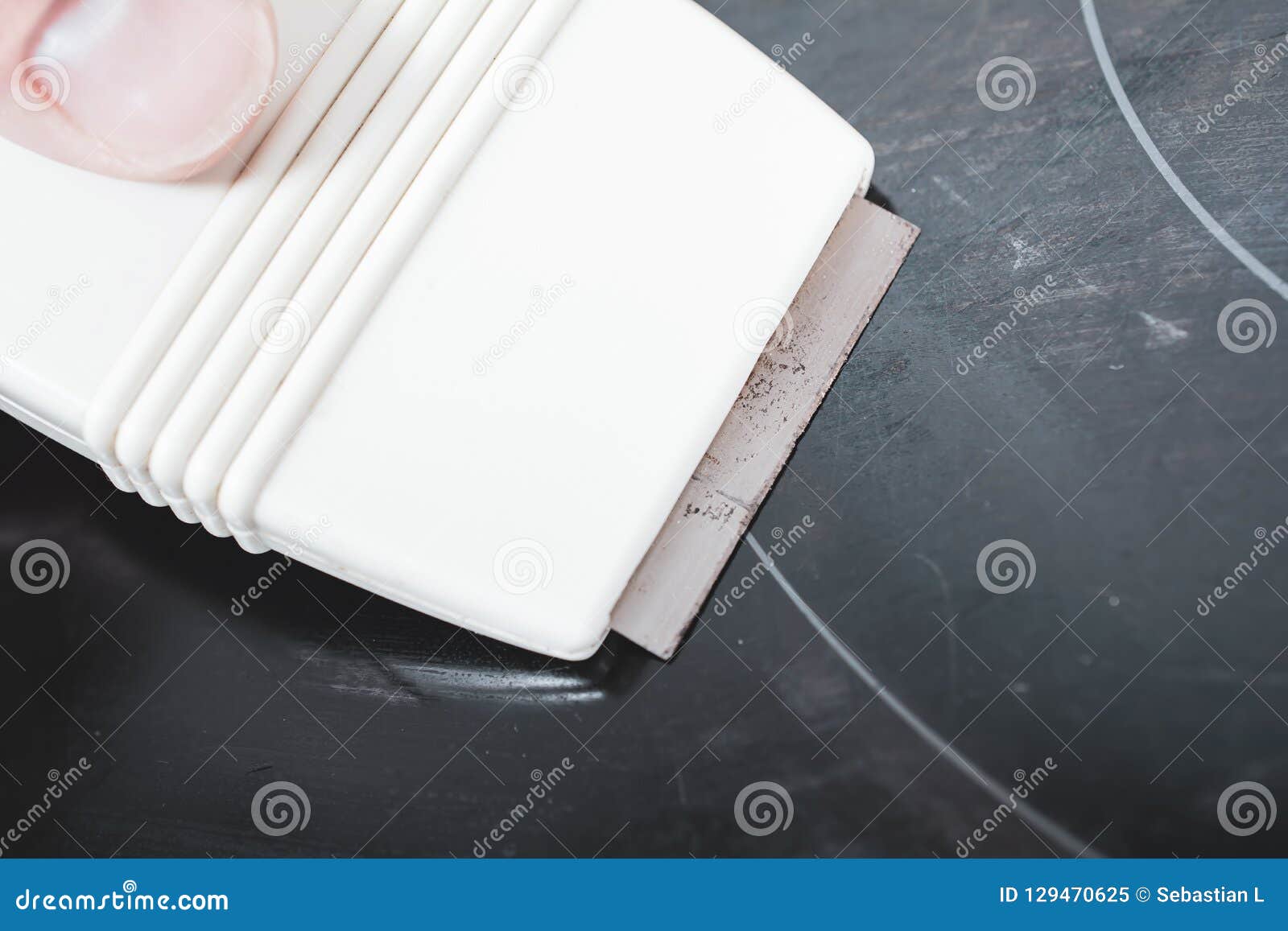 Cleaning a Ceramic Glass Cooktop with a Glass Scraper Stock Image Image of hand, concept