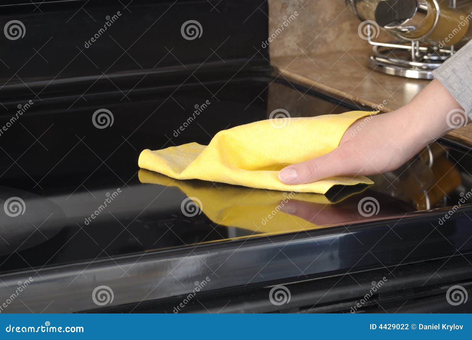 Cleaning the cooktop stock photo. Image of vitroceramic 4429022