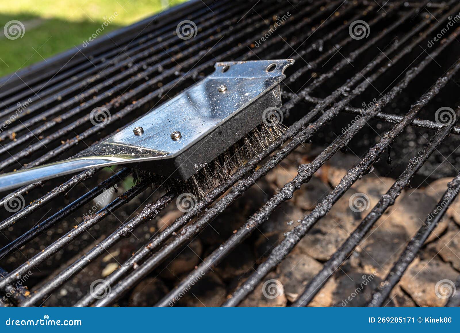 Cleaning a Dirty Grill while Standing on the Terrace and Emptying the