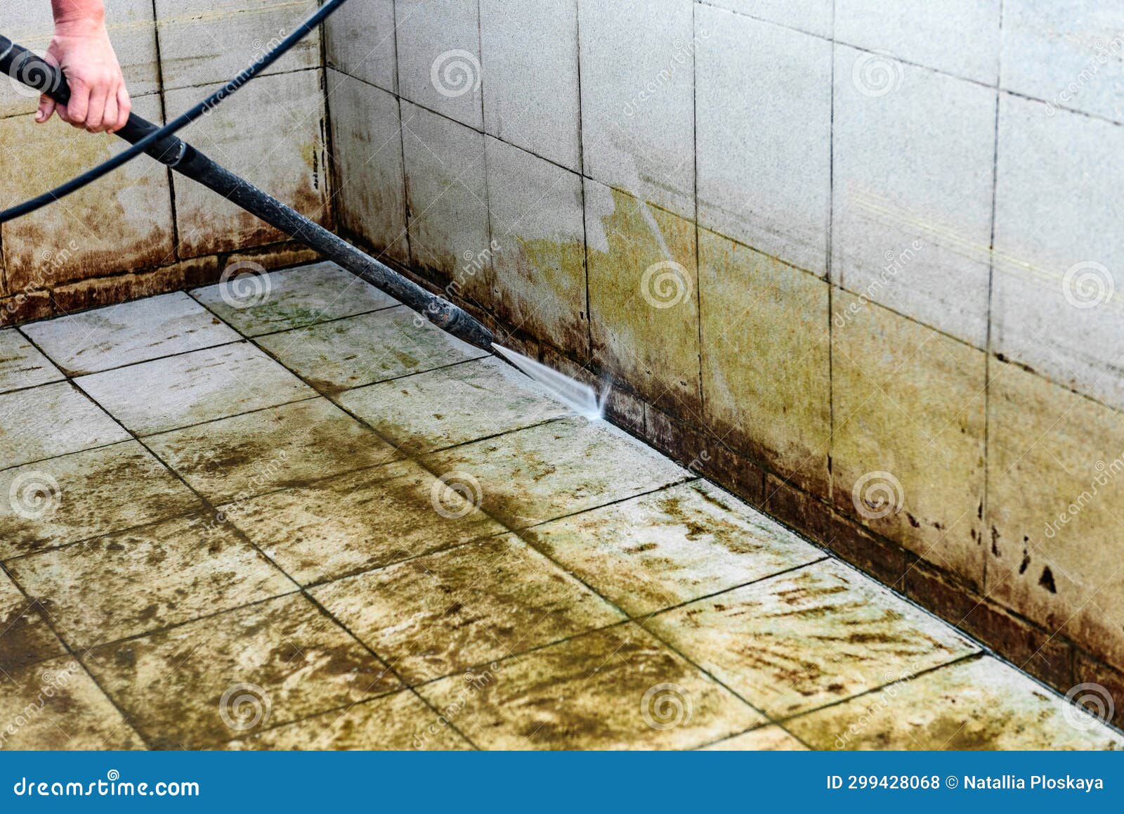 Cleaning a Dirty Pool with a Highpressure Washer. Stock Photo Image