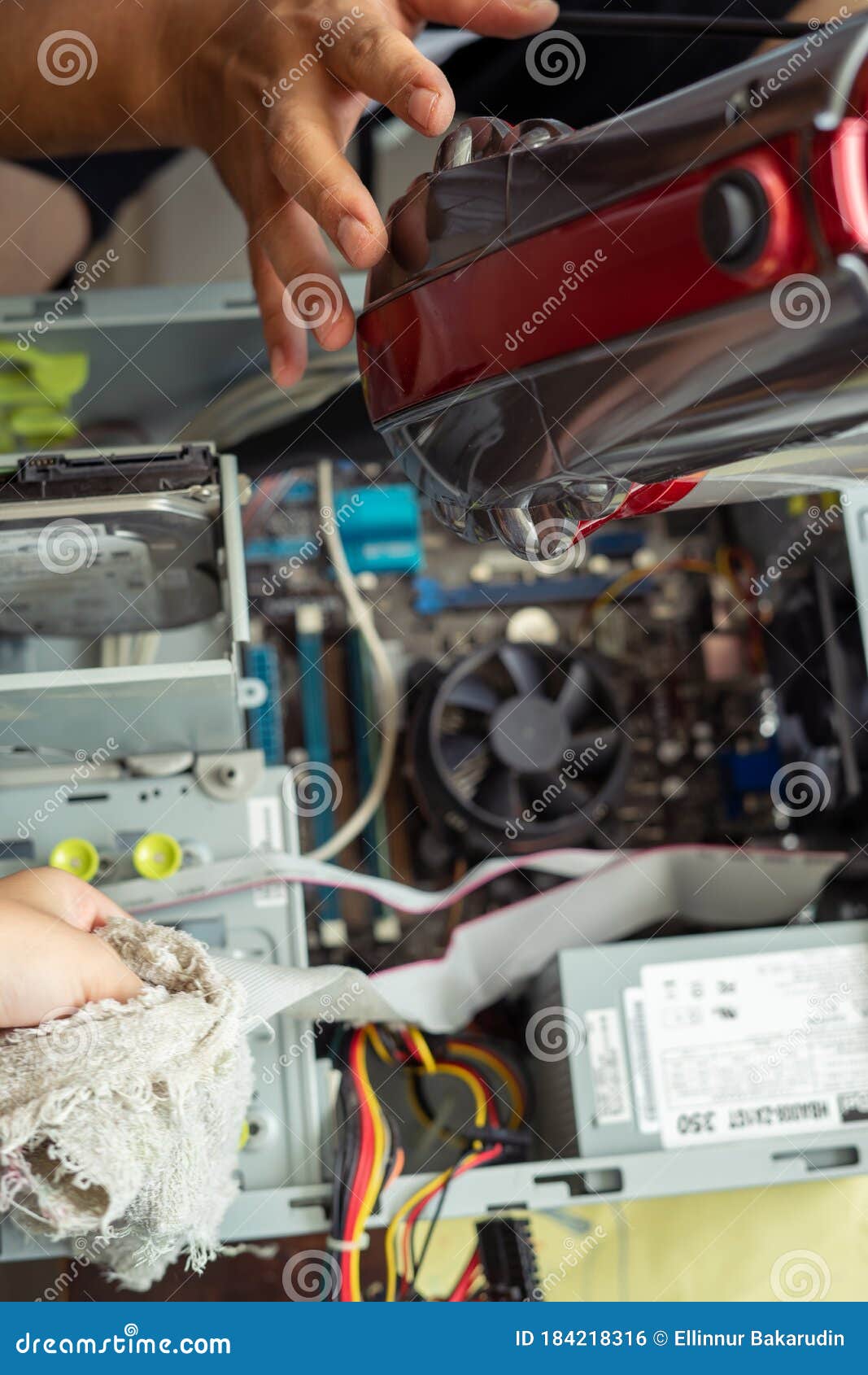 Cleaning and Fixing the Personal Computer PC with a Vacuum Cleaner