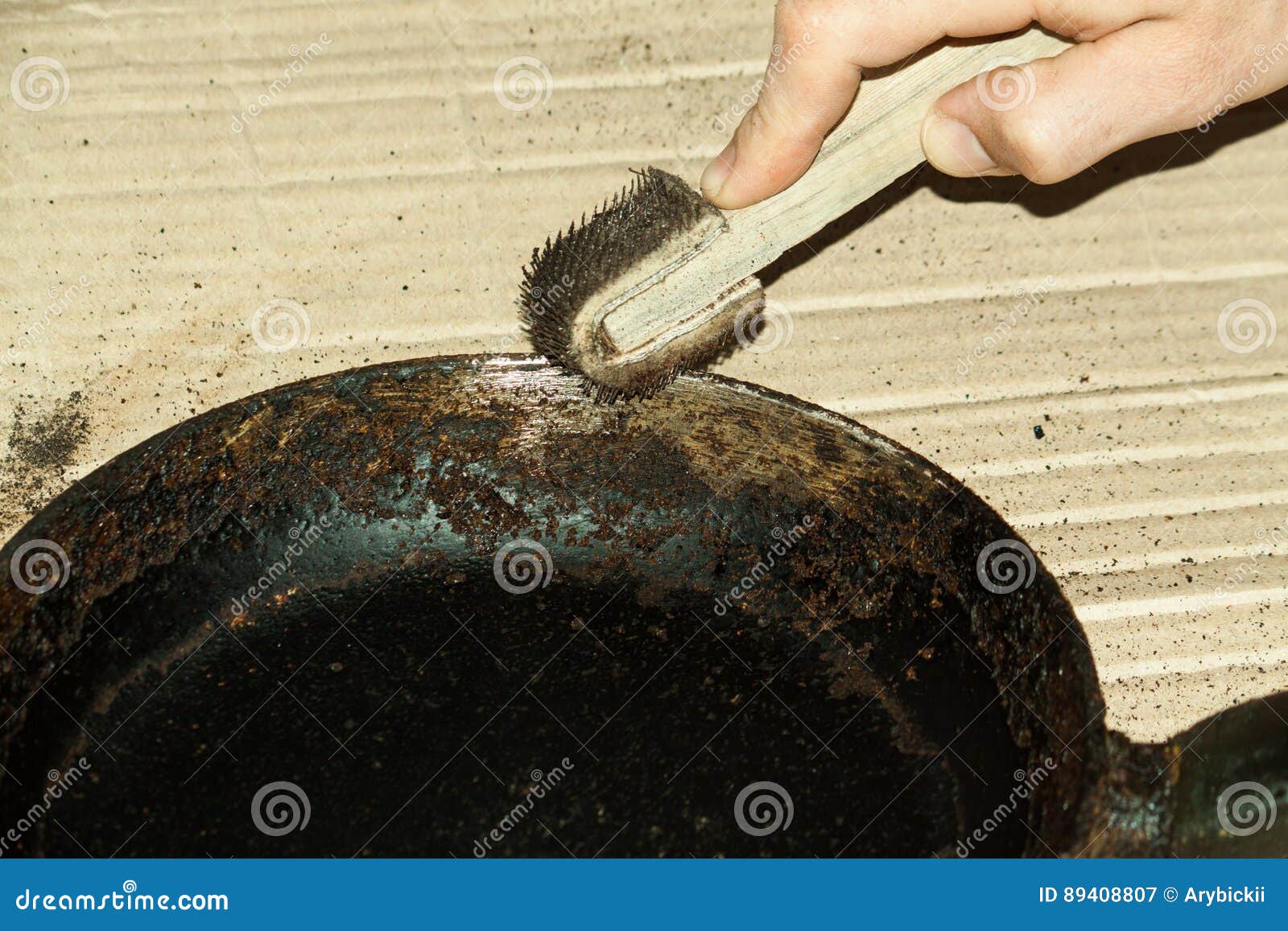 Cleaning of the frying pan stock image. Image of frying 89408807