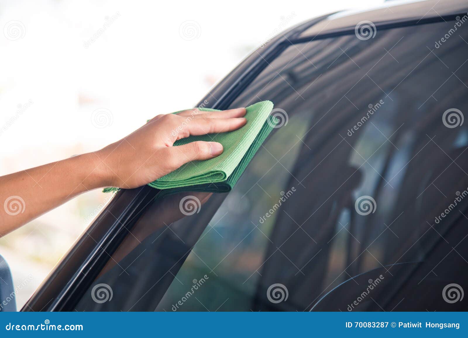 Cleaning glass car stock image. Image of detailing, green 70083287