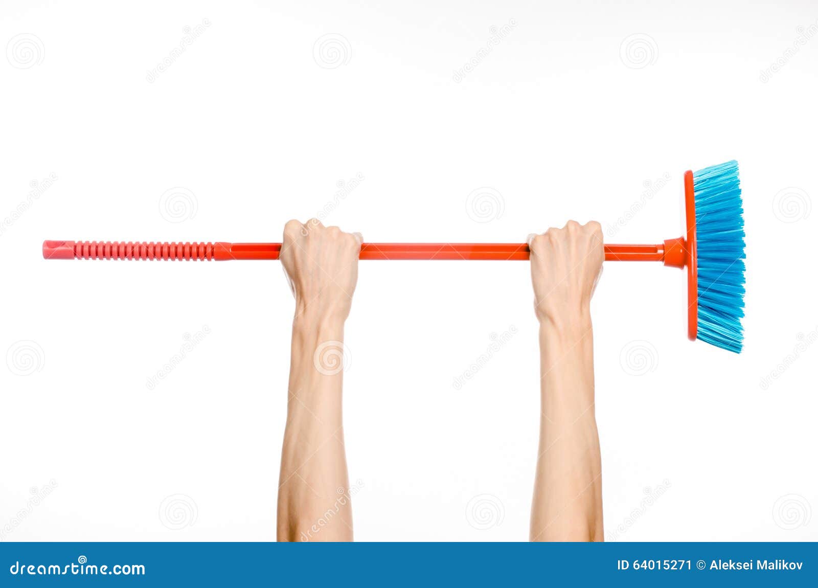 Cleaning the House Topic Human Hand Holding a Red Broom Stock Image